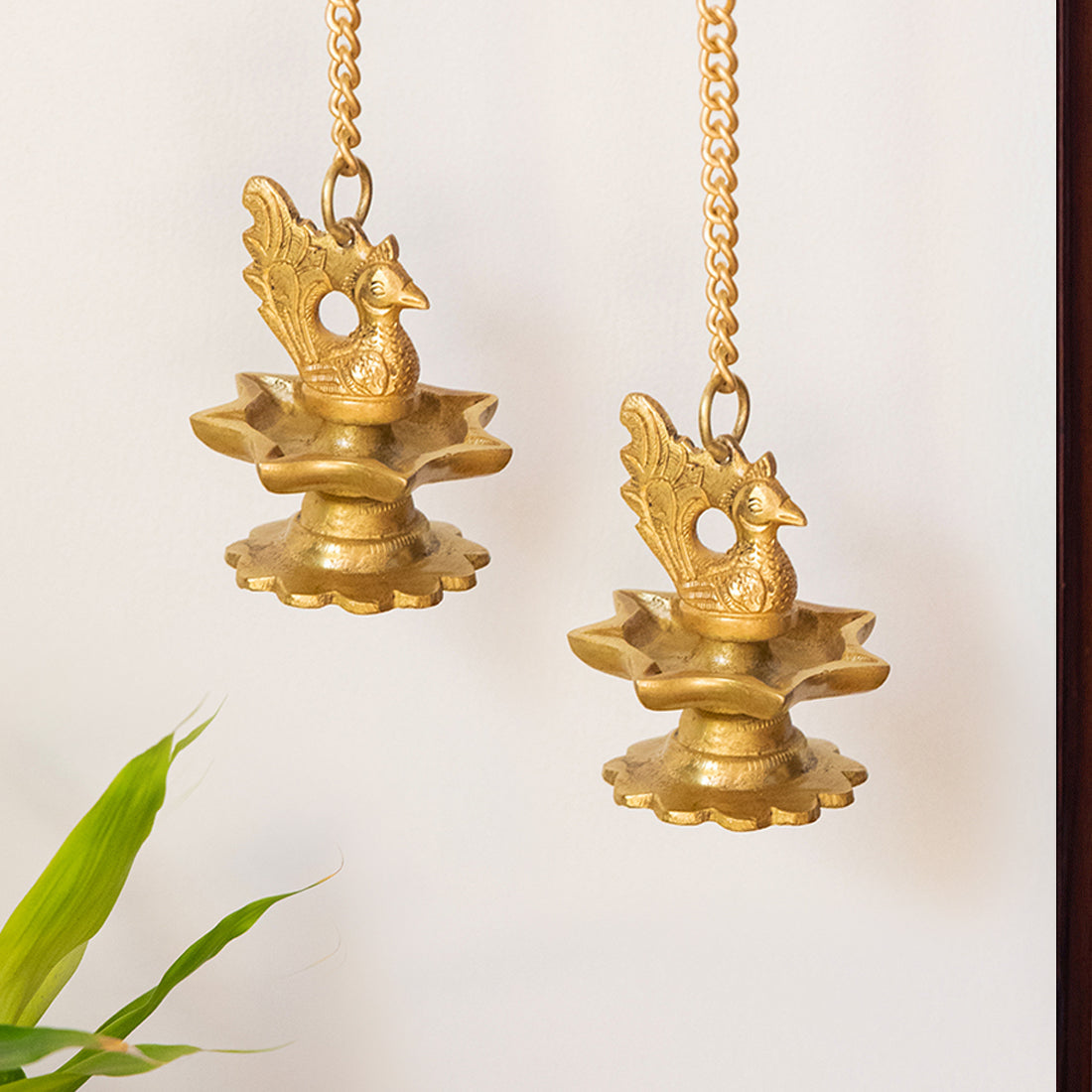 EXCLUSIVELANE 'Flying Swans' Hand-Etched Decorative Hanging Diya Set In Brass (7 Wicks)