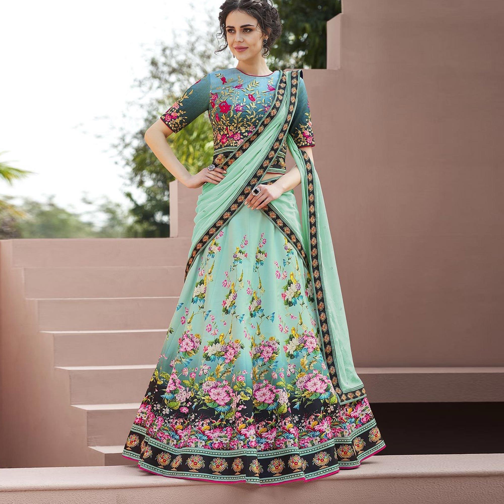 Peachmode Eye-Catching Mint Green Colored Designer Partywear Embroidered Silk Lehenga Choli
