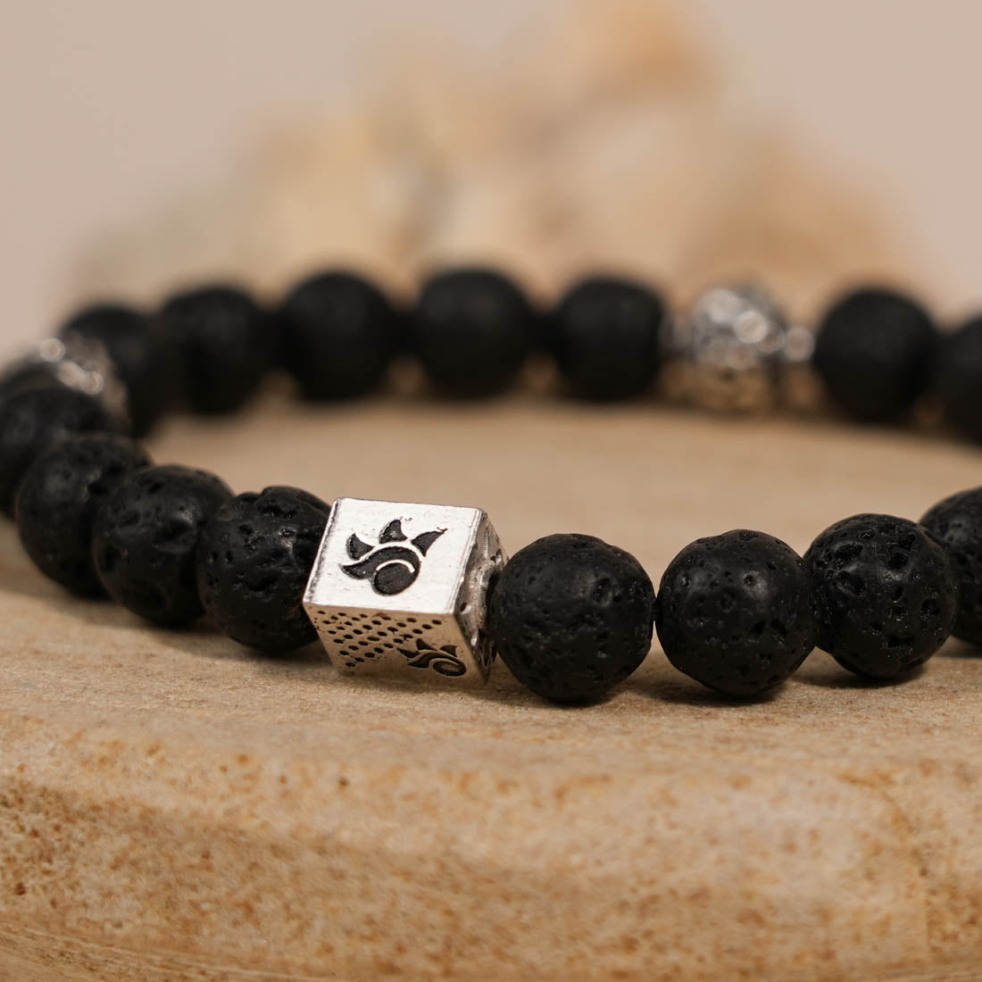 Prinjal Jewellers Lava Stone and Om Silver Beads Bracelet