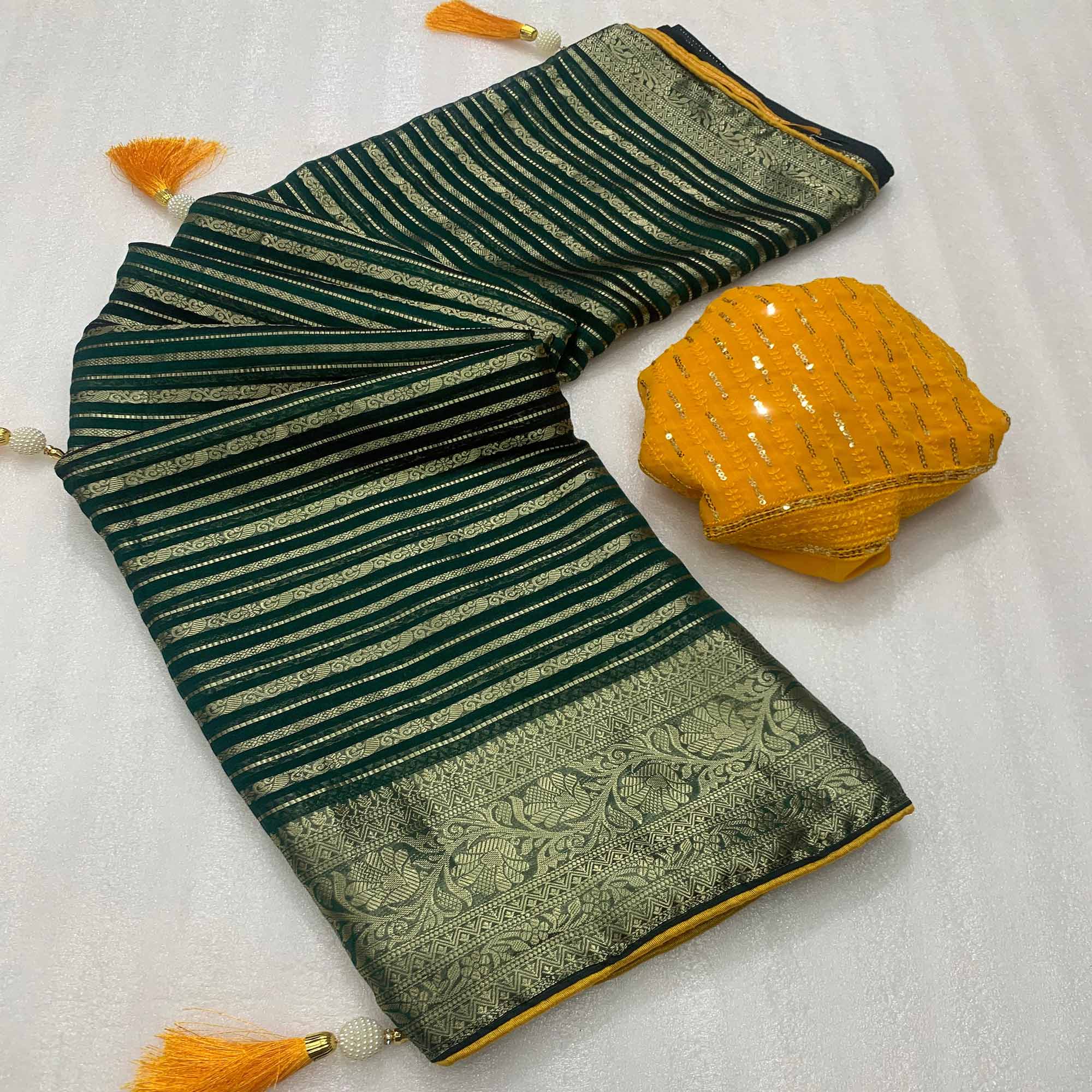 Peachmode Dark Green Woven Georgette Saree With Tassels