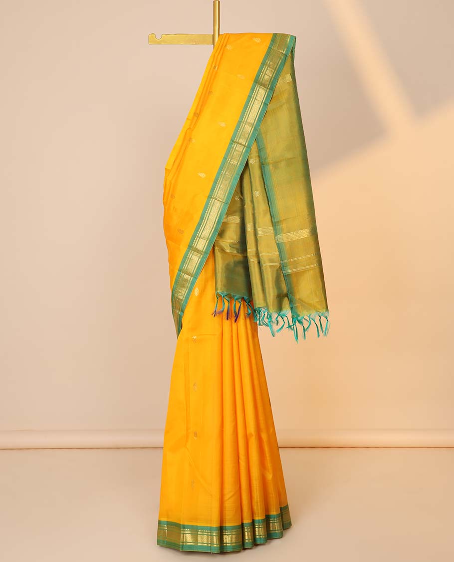 Pothys Orange zari buttas silk saree, contrast zari design pallu & zari border of rekku,banaras & mayil kann designs