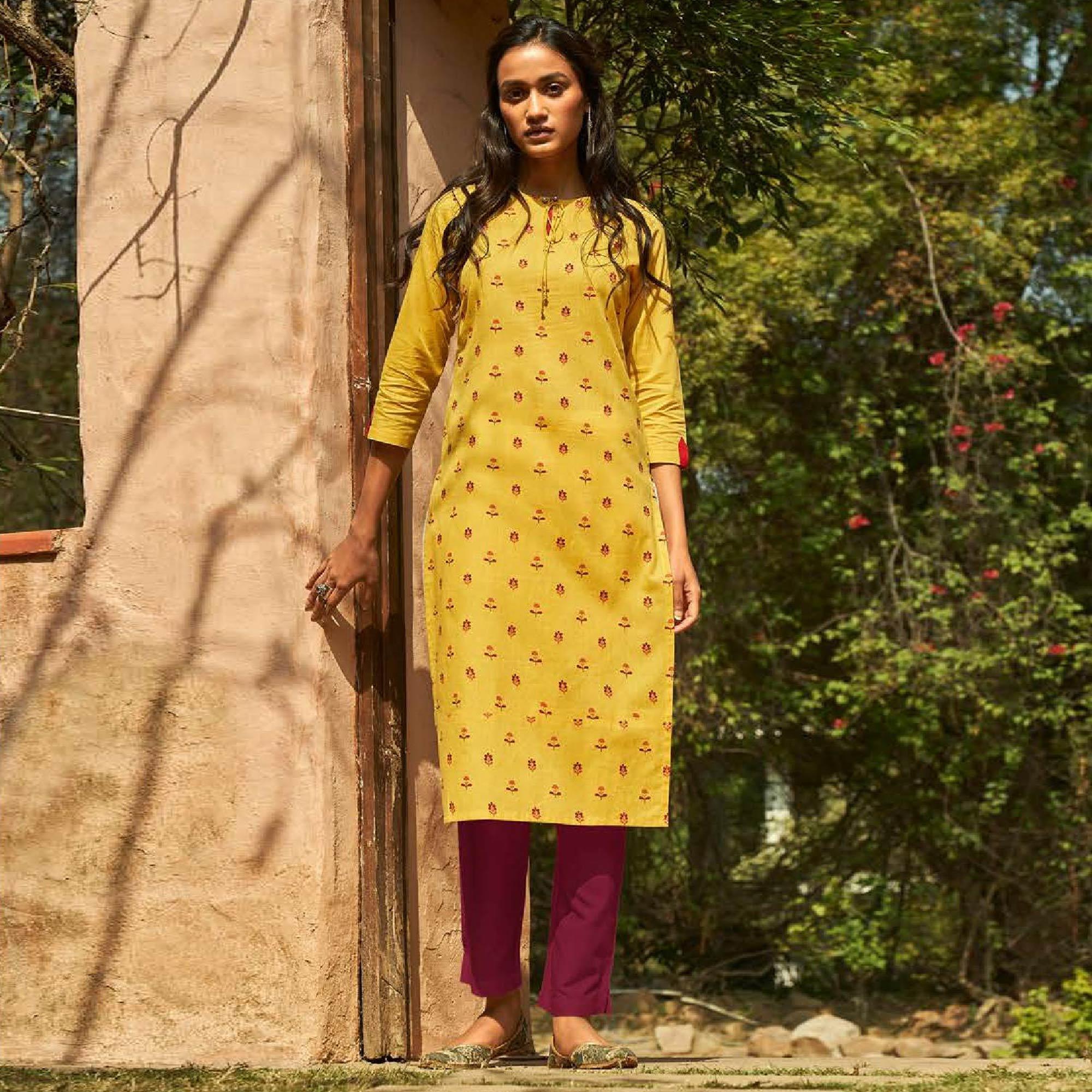 Peachmode Imposing Yellow Colored Casual Wear Embroidered Cotton Kurti With Bottom