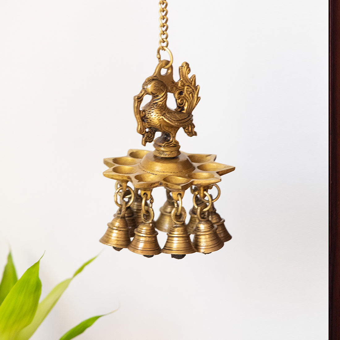 EXCLUSIVELANE 'Peacock Bliss' Hand-Etched Decorative Hanging Diya with Bell In Brass (9 Diyas & Bells)