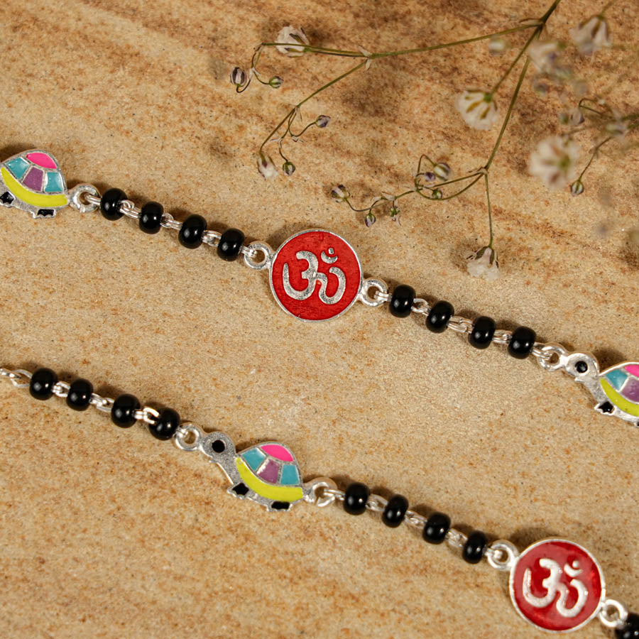 Prinjal Jewellers black beads multicolor tortoise Om silver nazariya for kids