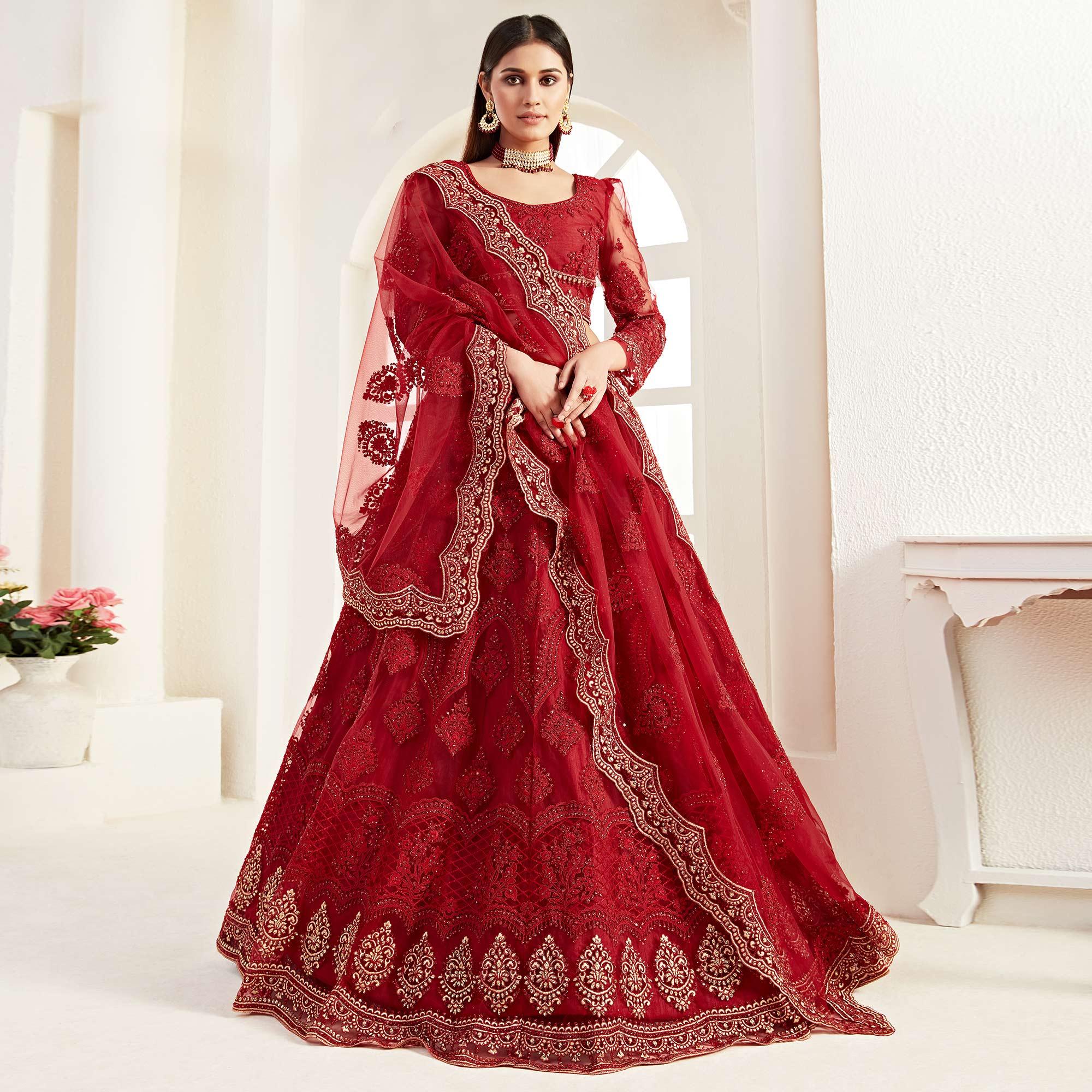 Peachmode Jazzy Red Colored Cording Thread And Zari Embroidery Wedding Wear Net Lehenga Choli