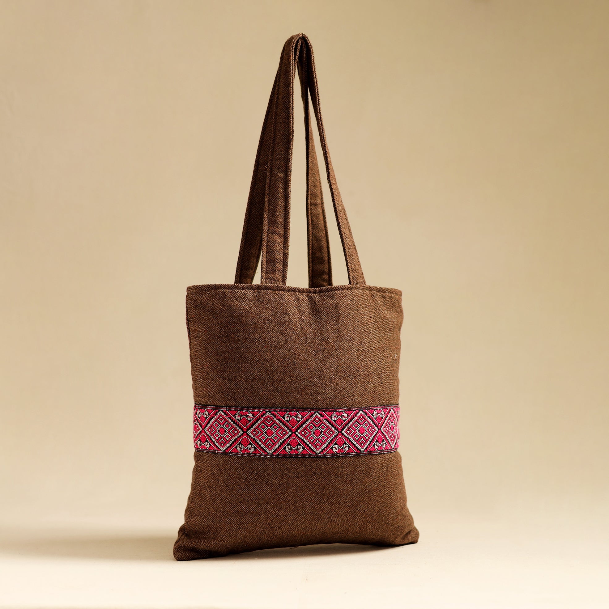 NOORI BAZAR Assam Border Woolen Jhola Bag by Kritenya Manjuri