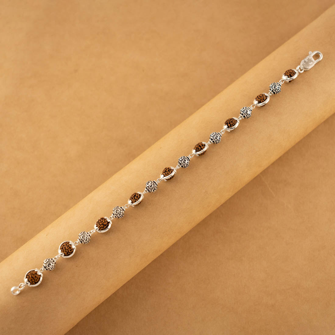 Prinjal Jewellers Silver Rakhi with Om Beads Capping and Rudraksha Bracelet - view 4