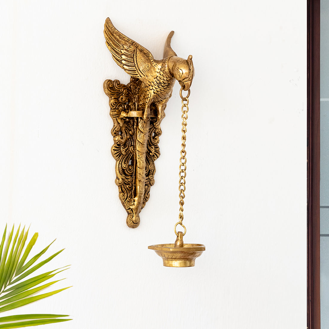EXCLUSIVELANE 'Golden Parrot' Decorative Wall Hanging Brass Diya (5 Wicks, 1.5 Kg, Hand-Etched)