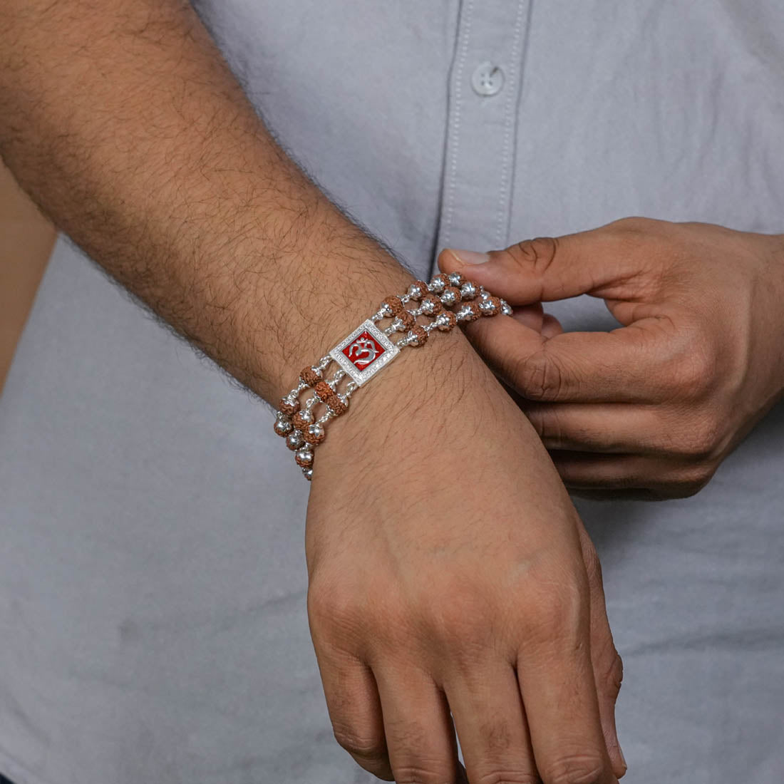 Prinjal Jewellers Rudraksha Silver Om in Red Triple Line Bracelet - view 3
