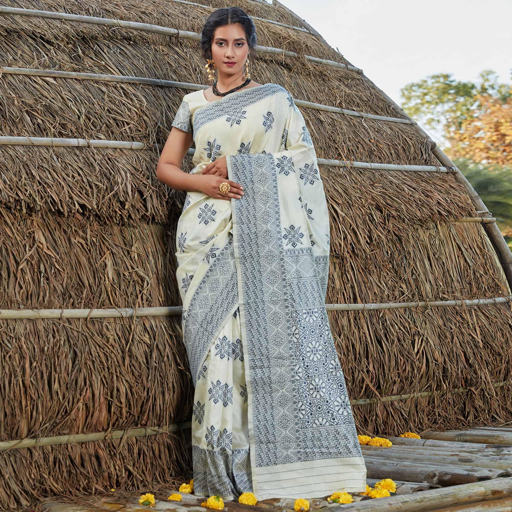Peachmode Flamboyant Offwhite Colored Festive Wear Woven Banarasi Silk Saree
