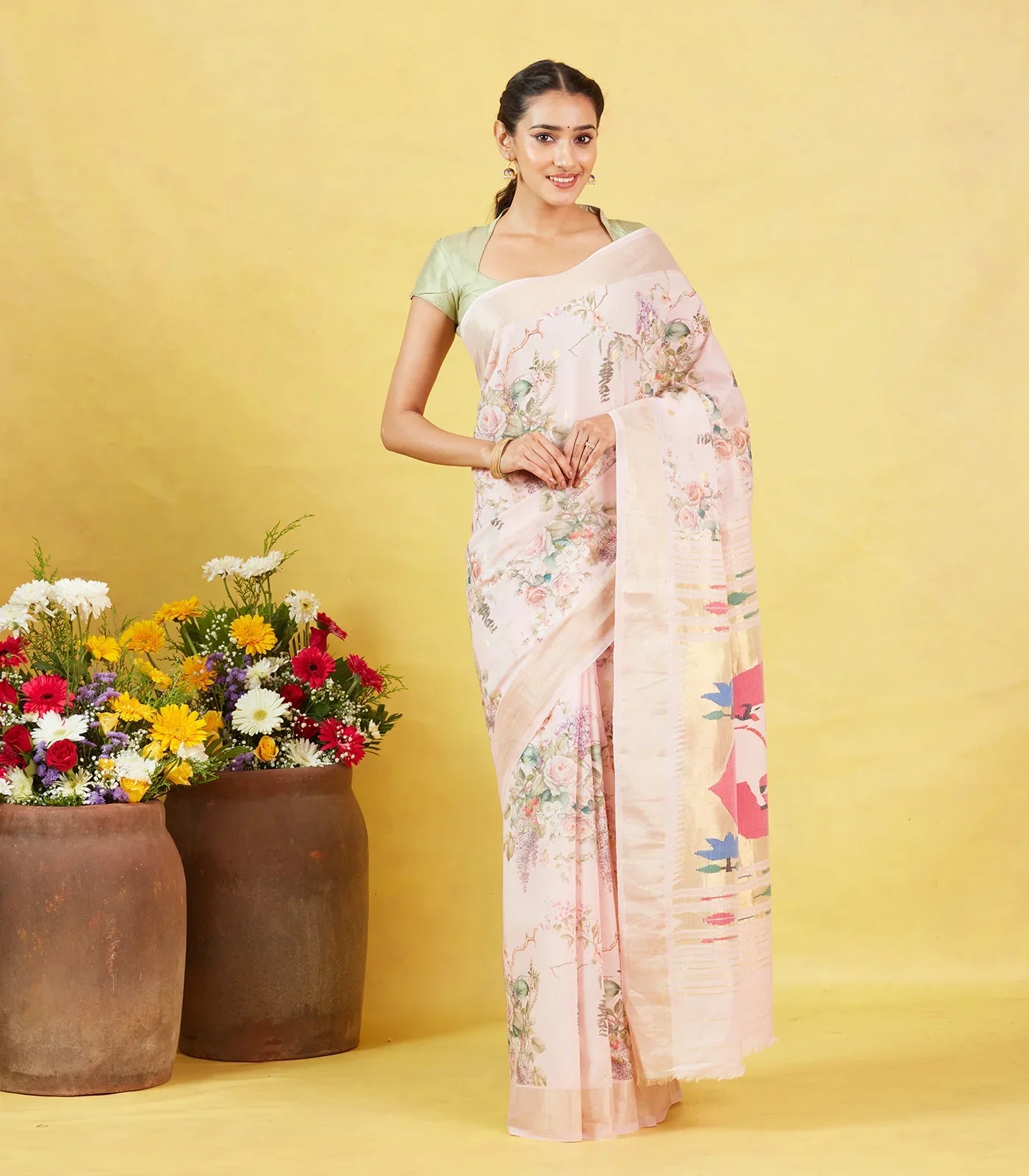 RmKV White Crepe Silk Saree Is Printed With Floral Motifs & Paithani Pallu