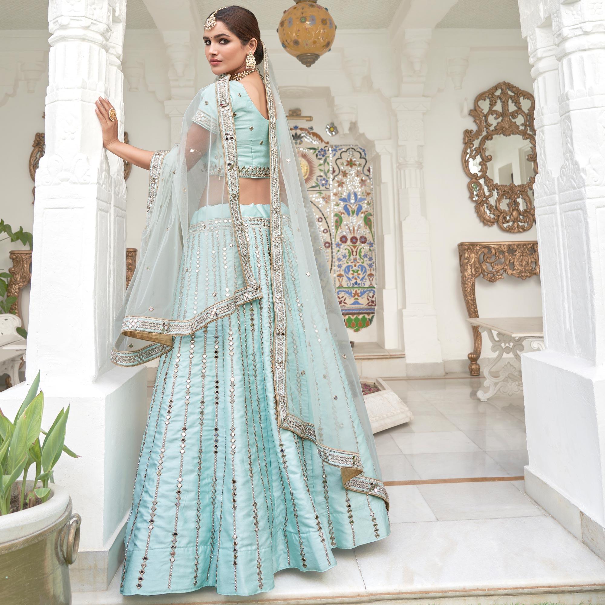 Peachmode Intricate Ice Blue Coloured Wedding Wear Mirror Work Heavy Silk Lehenga Choli - view 4