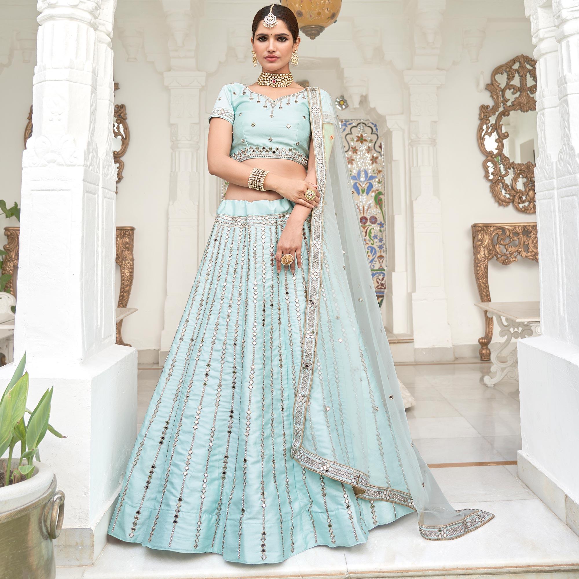 Peachmode Intricate Ice Blue Coloured Wedding Wear Mirror Work Heavy Silk Lehenga Choli