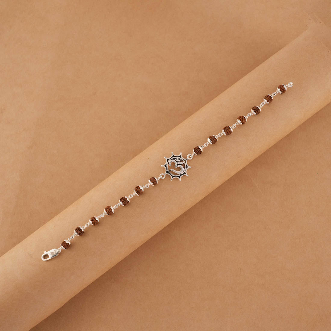 Prinjal Jewellers Rudraksha silver bracelet with Om in Pointed Circle single line - view 3