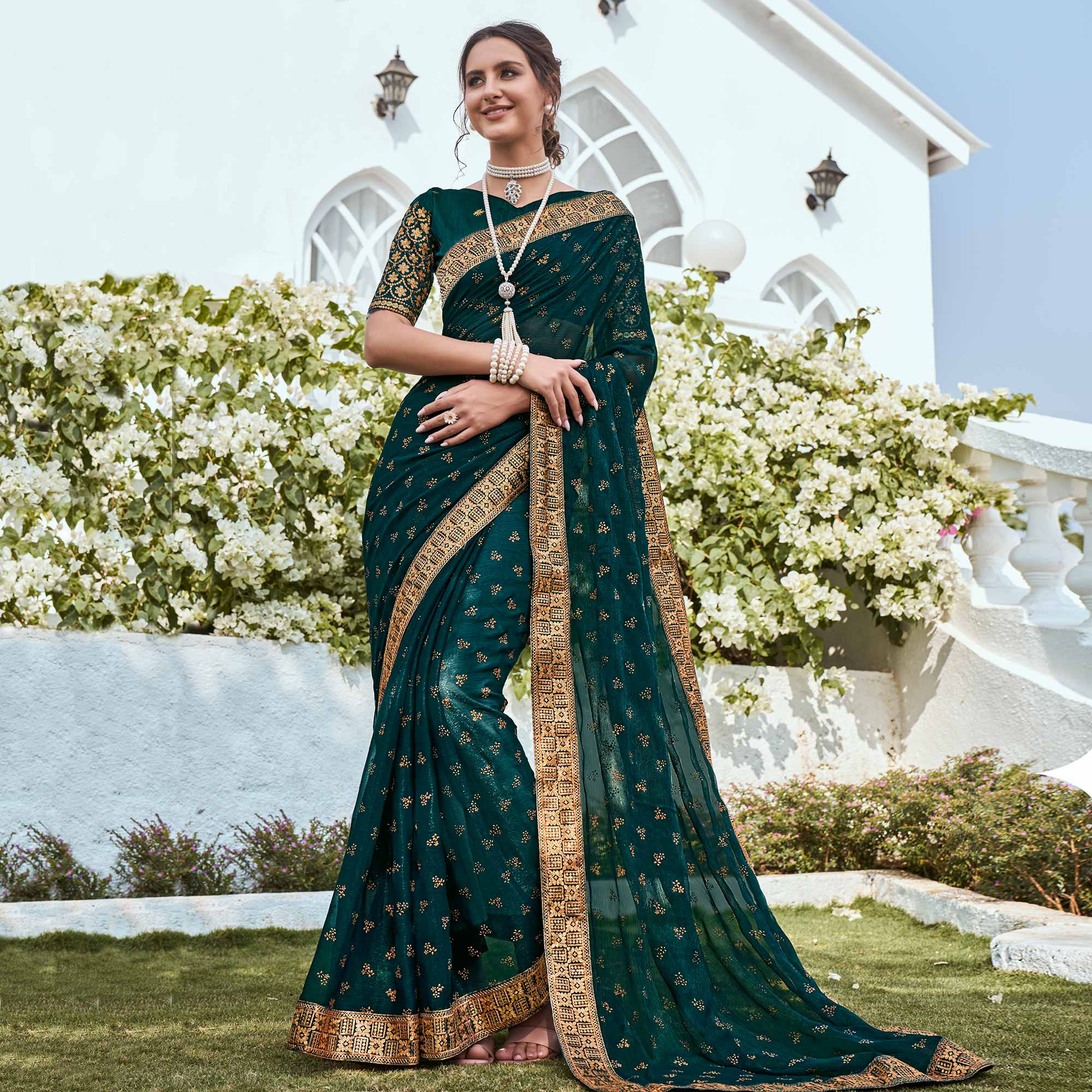 Peachmode Dark Teal Green Foil Printed Georgette Saree With Embroidered Border