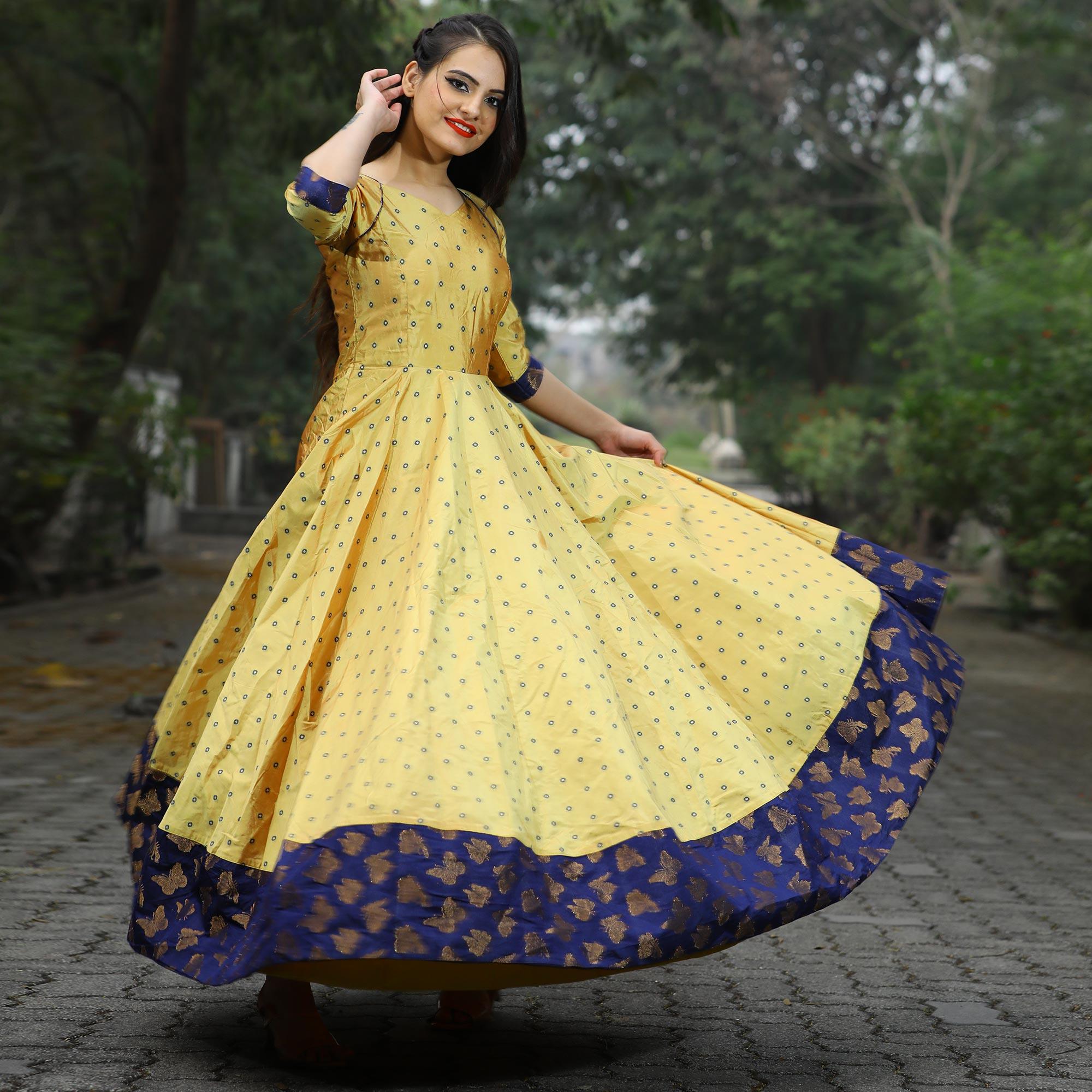Peachmode Seller Glowing Light Yellow Colored Partywear Tapetta Gown