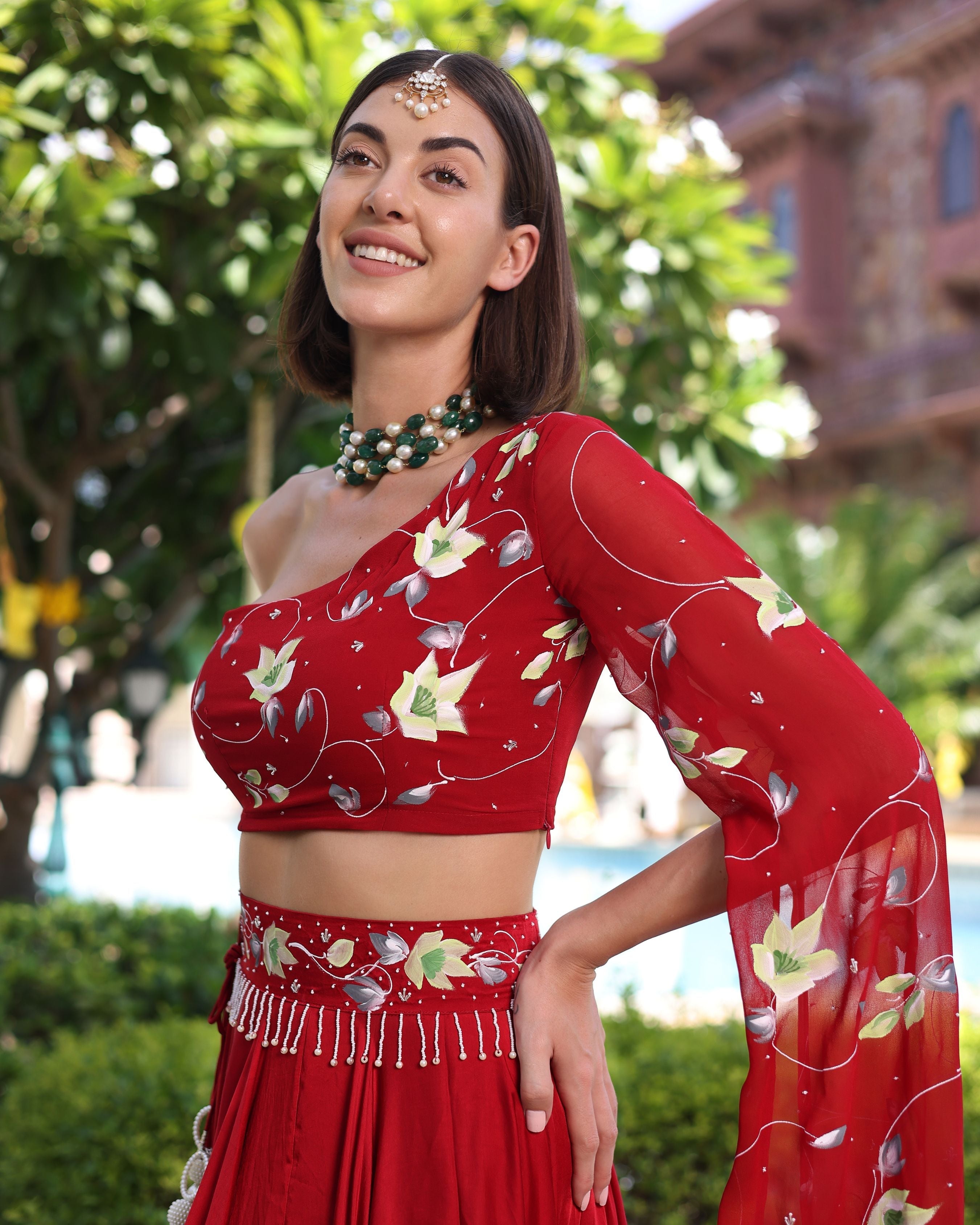 Aachho Rutvi Red Handpainted Satin Lehenga Set - view 2