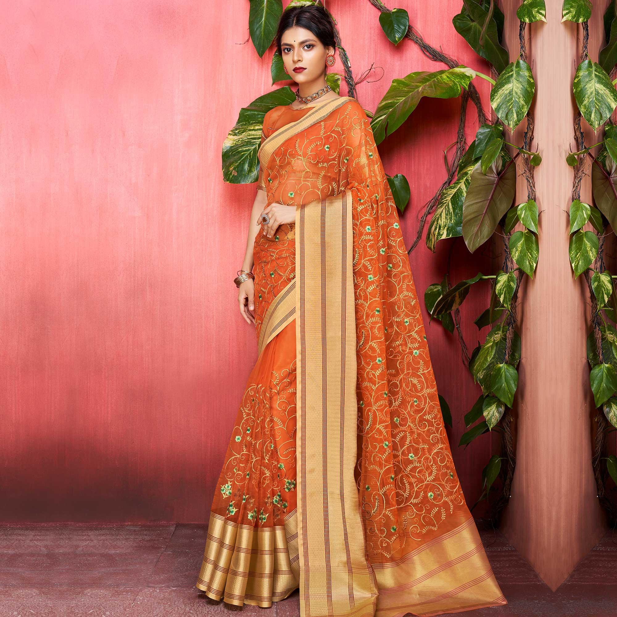 Peachmode Entrancing Orange Colored Party Wear Floral Embroidered Organza Saree