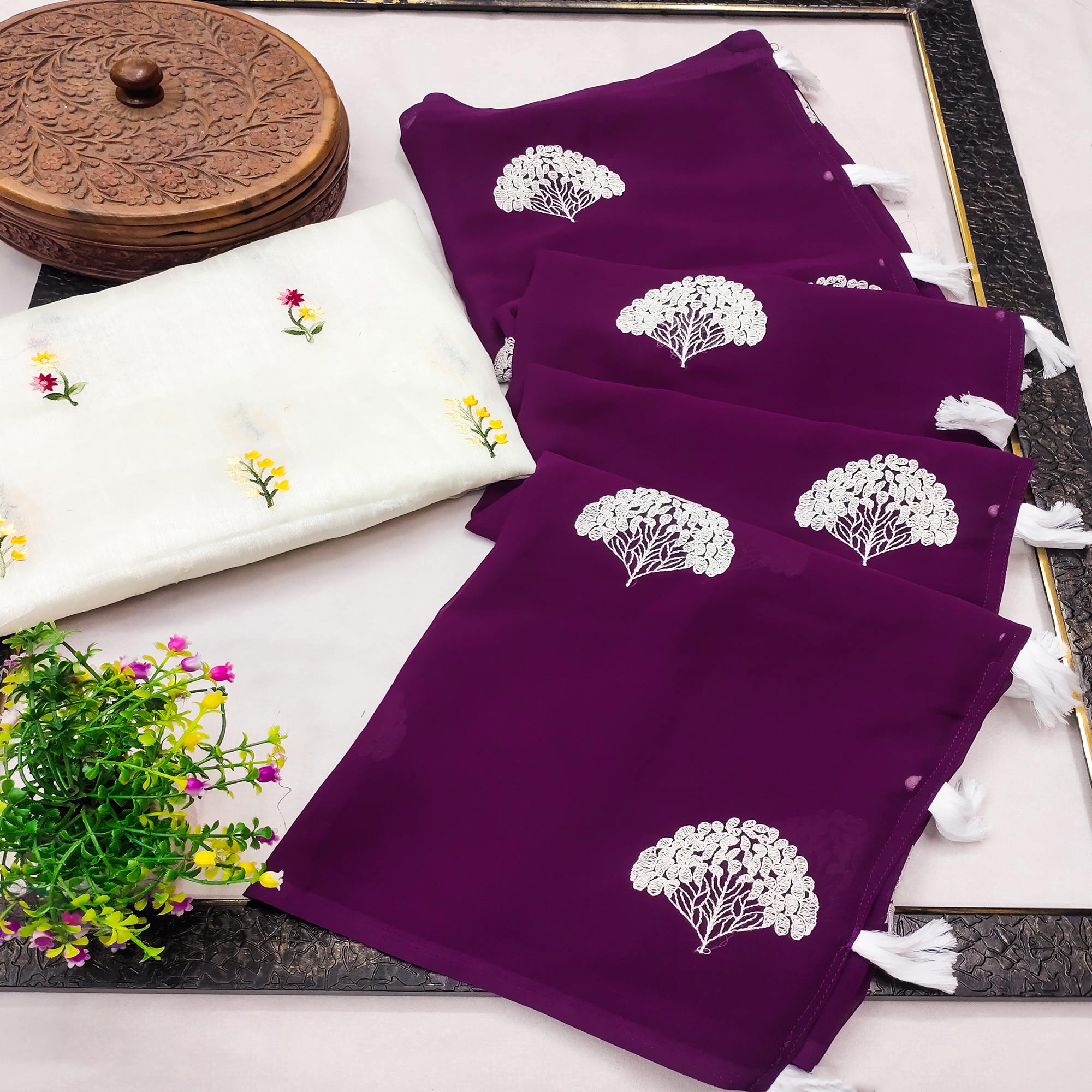 Peachmode Dark Purple Thread Embroidered Georgette Saree With Tassels