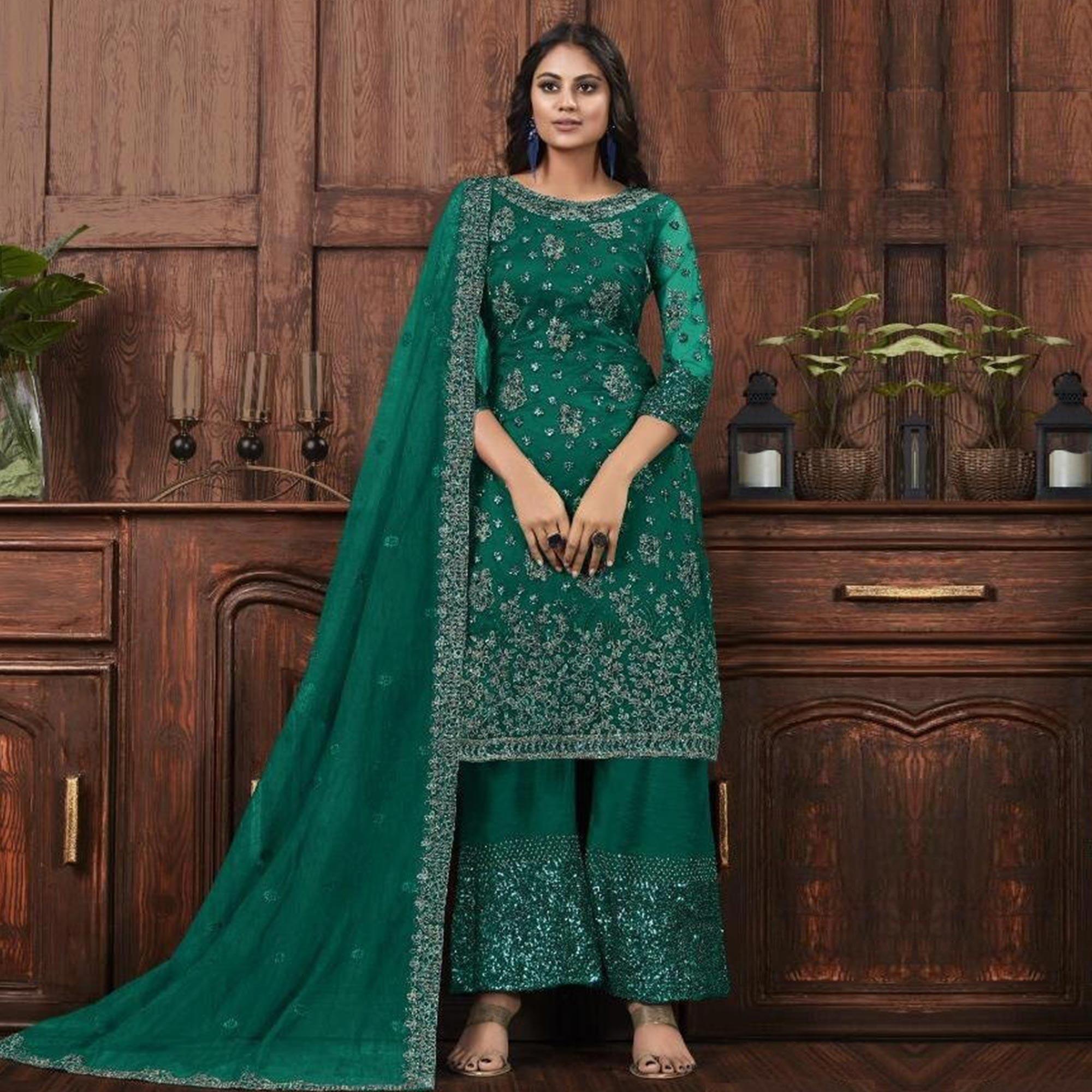 Peachmode Mesmerising Bottle Green Colored Partywear Embroidered Net Palazzo Suit