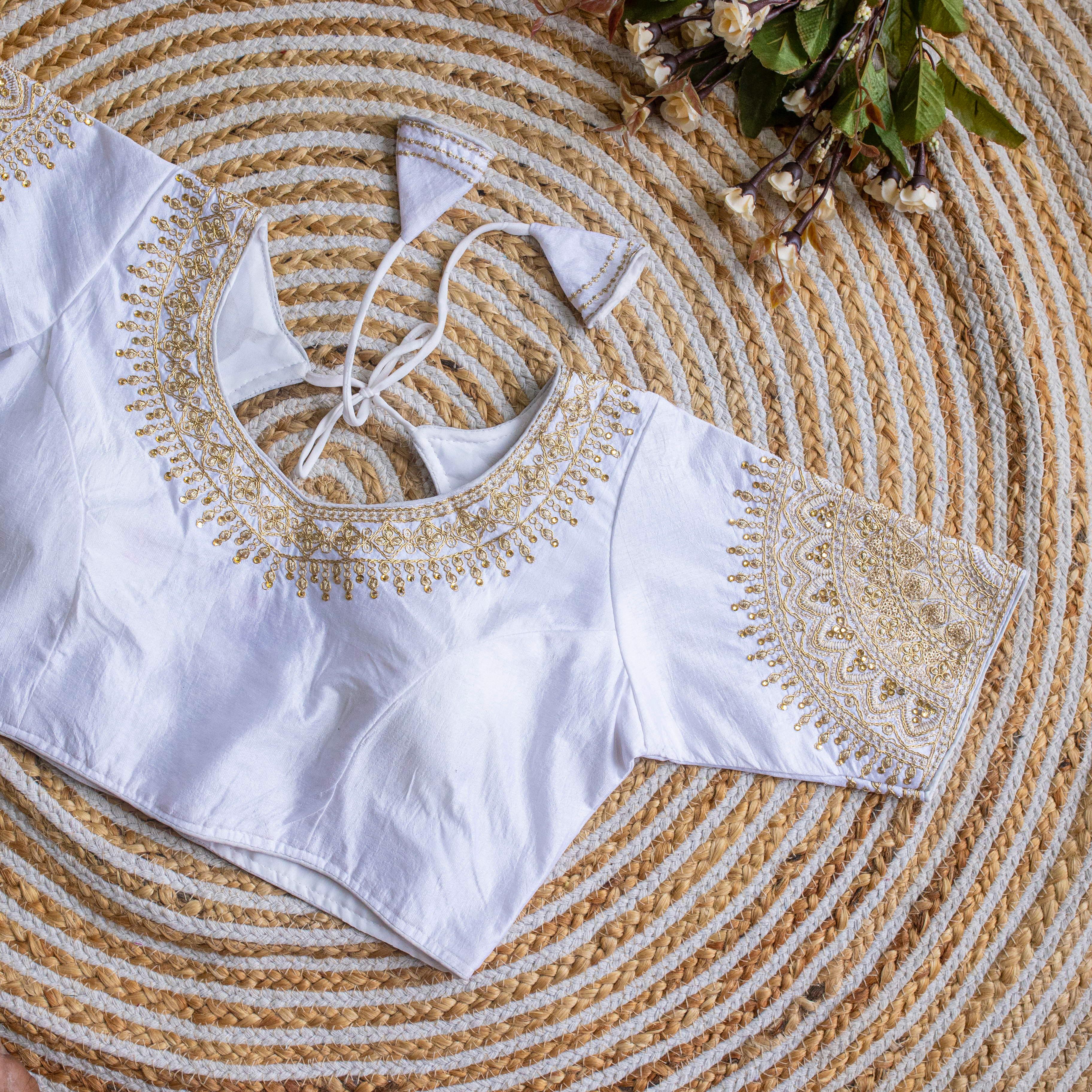 ClothsVilla White Luxurious Lucknowi Silk Blouse with Golden Embroidery and Sequins