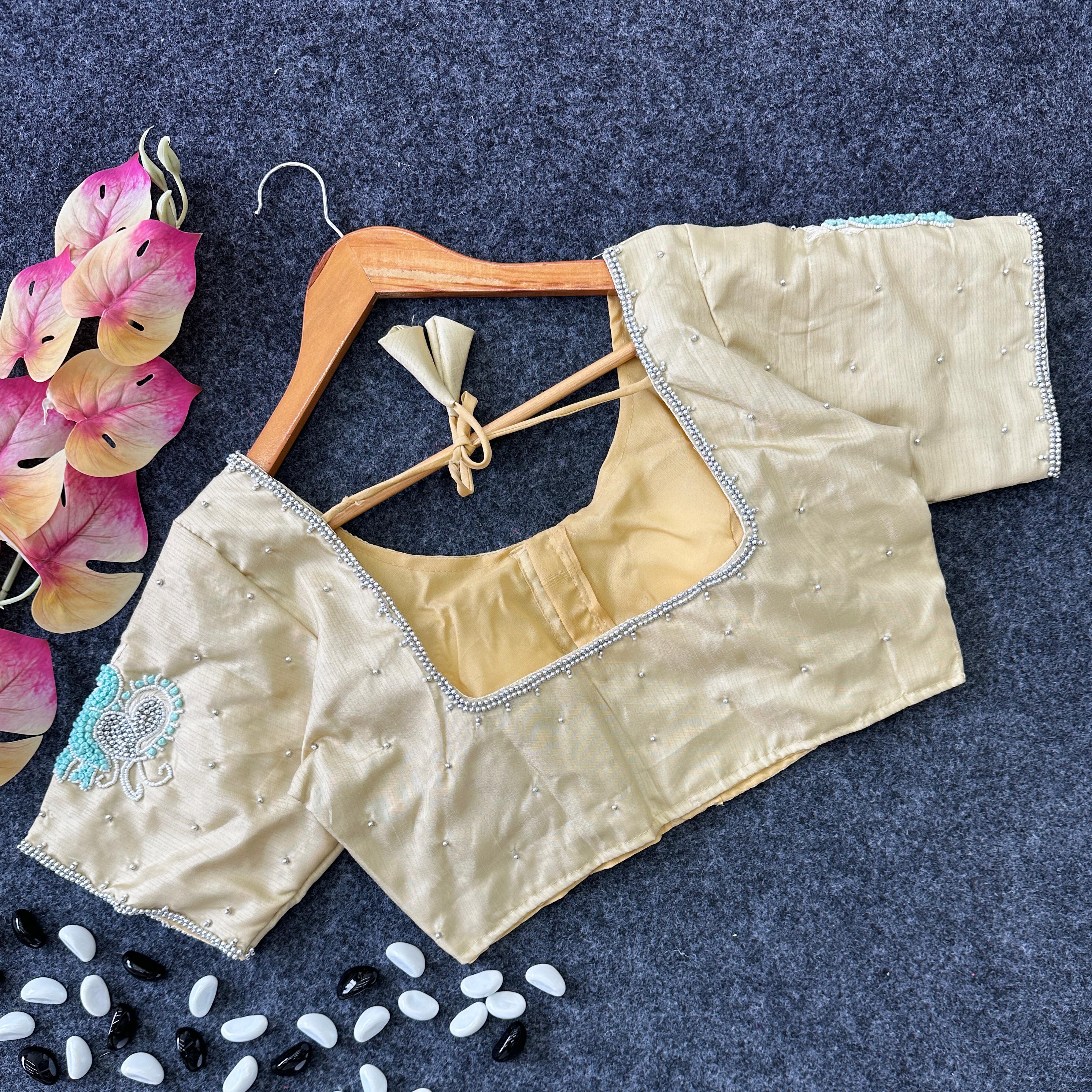 ClothsVilla Cream Color Party Wear Blouse in Lemon Silk with Elegant Handwork and Knot Design