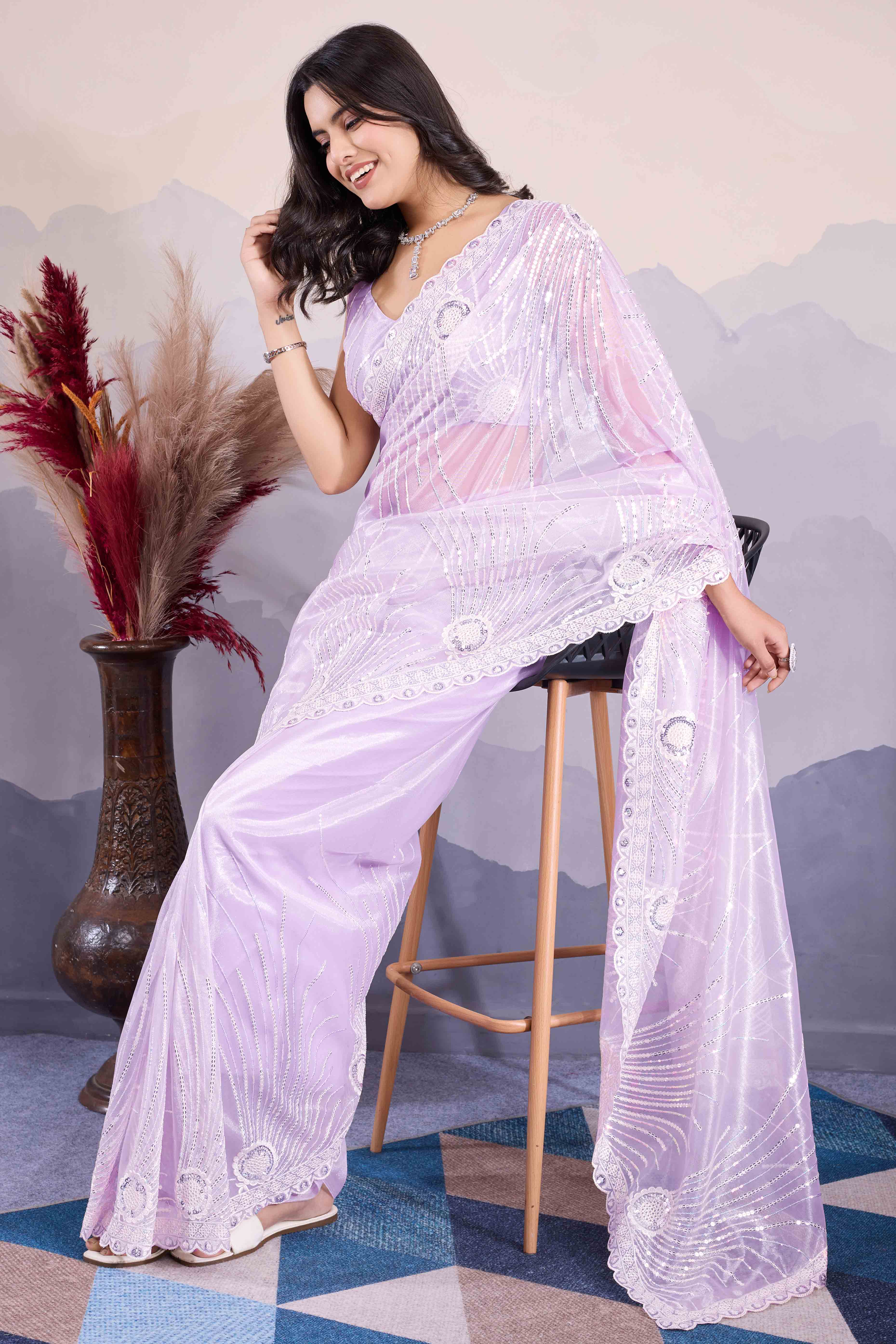 Peachmode Lavender Sequins Embroidered Twill Net Saree
