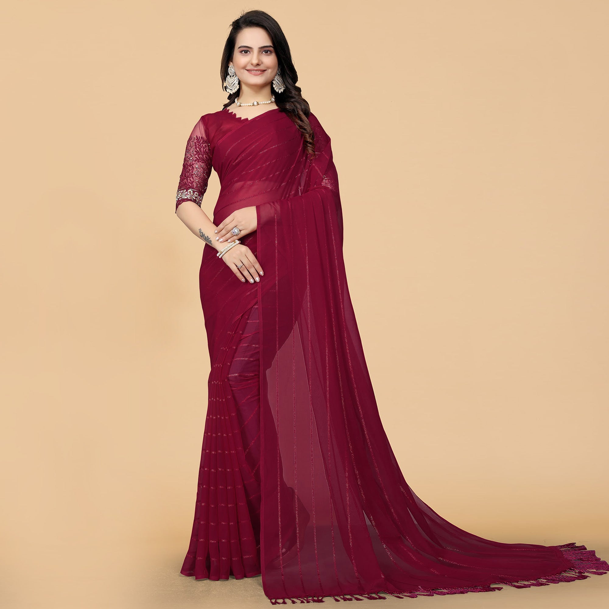 Peachmode Maroon Woven Georgette Saree with Tassels