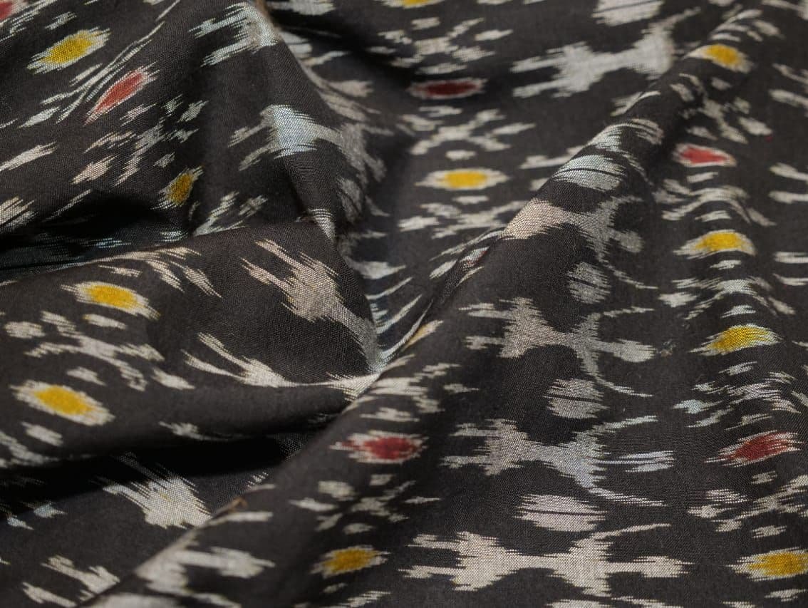 IndianVillèz White Tribal on Black with Red & Yellow Motif Cotton Ikat Fabric - view 3