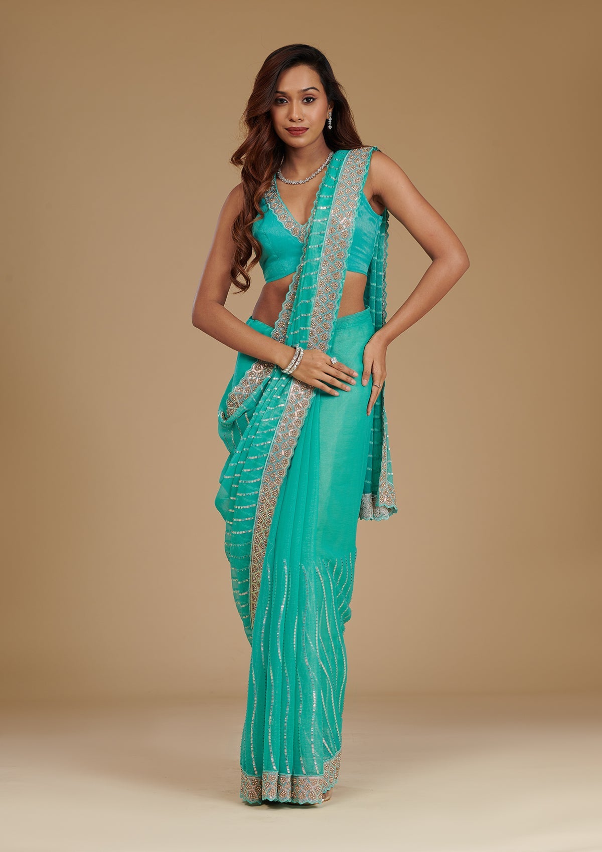 Koskii Turquoise Blue Stonework Chiffon Saree