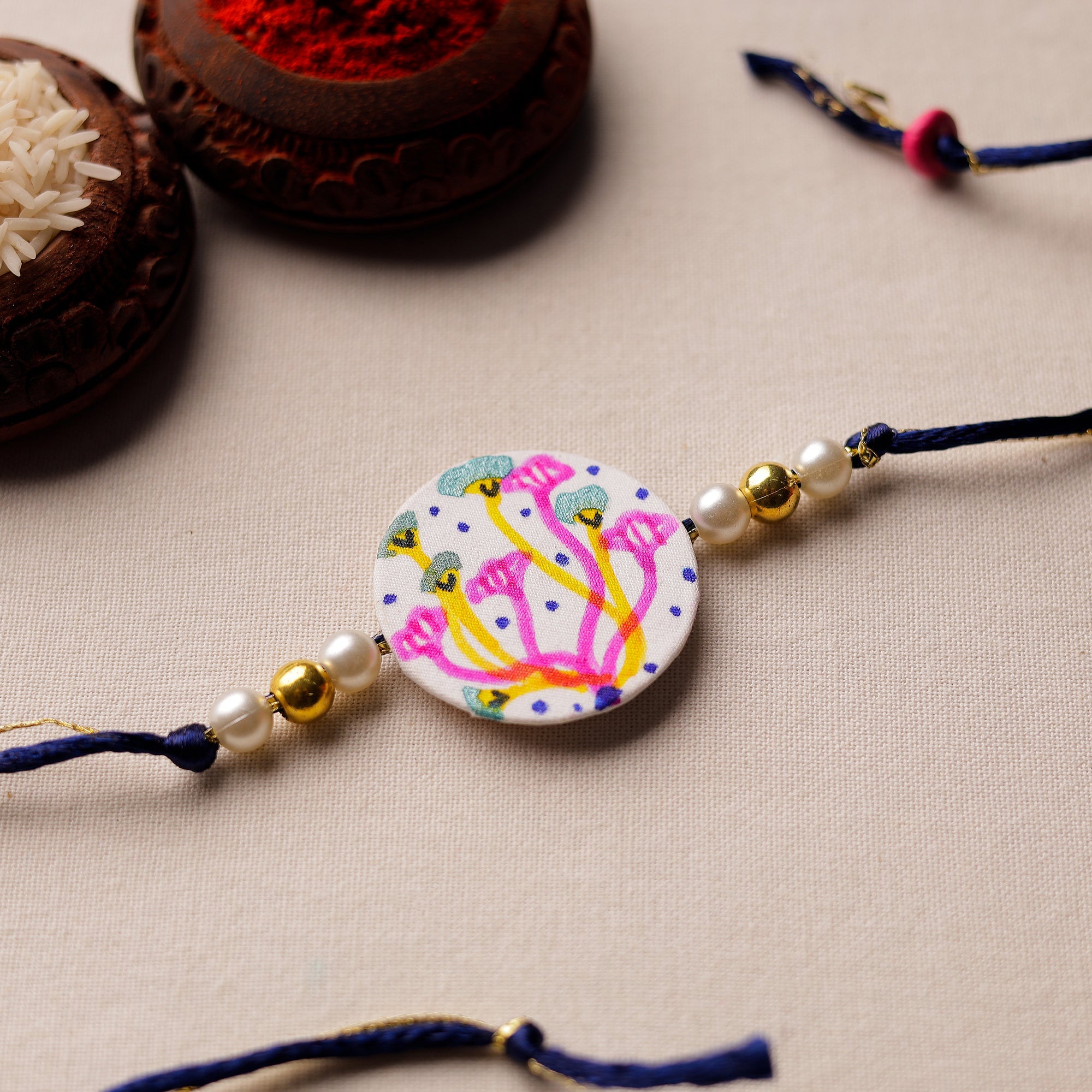KHUSHBASH - HAPPY LOOM OF EAST Bishnupur Handpainted Fabric Rakhi 15