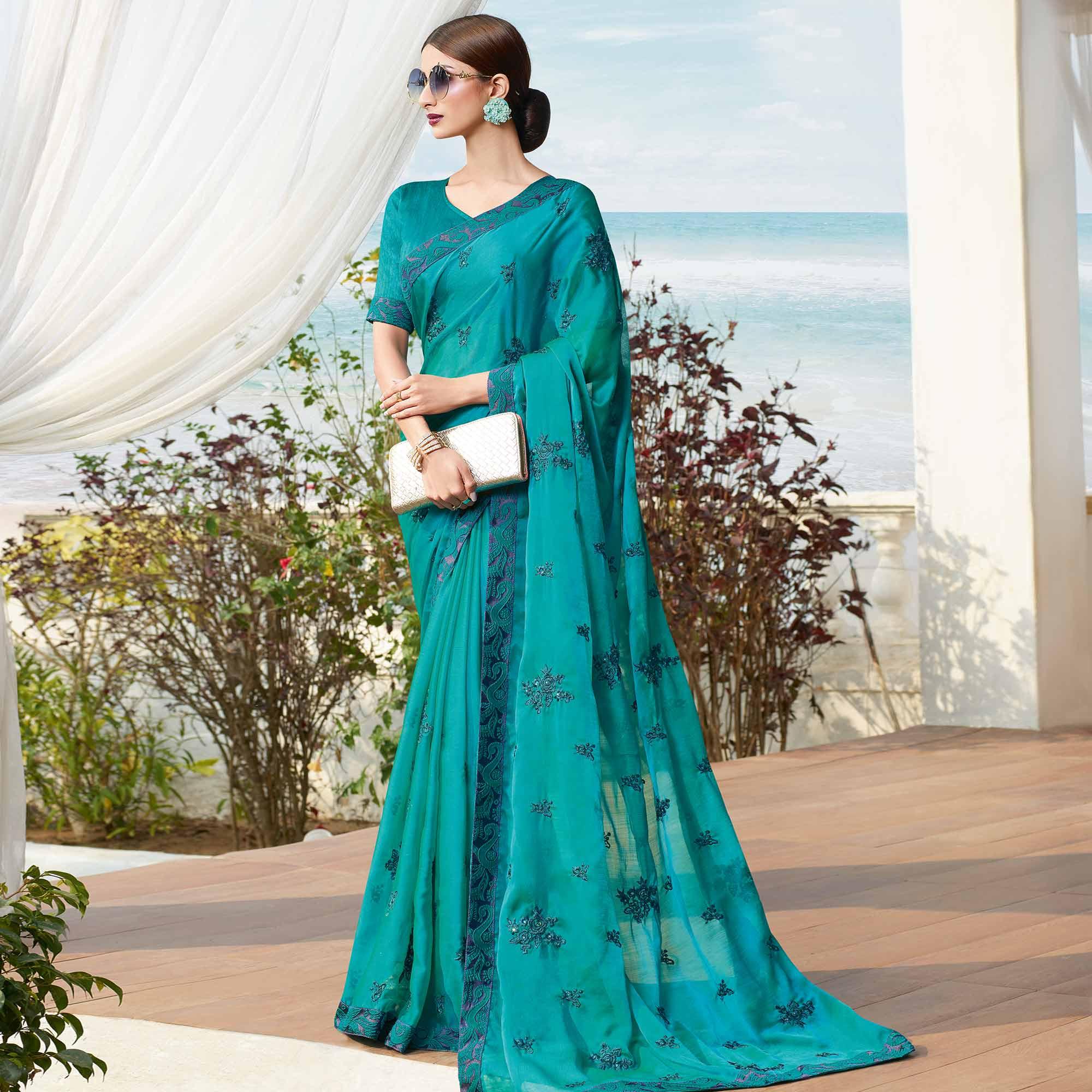 Peachmode Flamboyant Rama Blue Colored Partywear Embroidered Georgette Saree