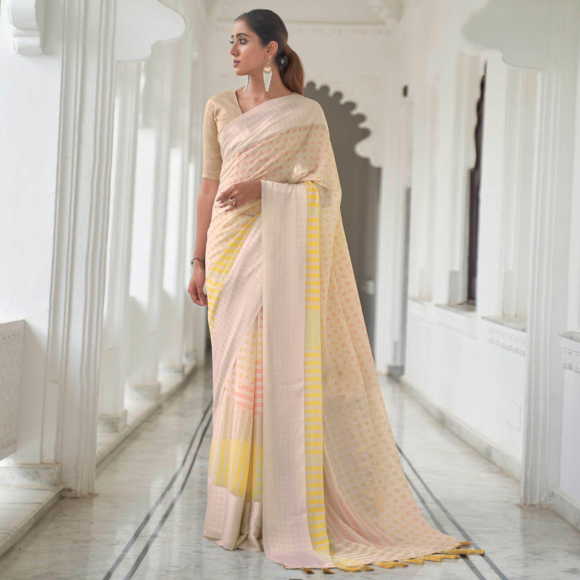 Peachmode Cream Casual Wear Foil Printed Georgette Saree With Jacquard Border