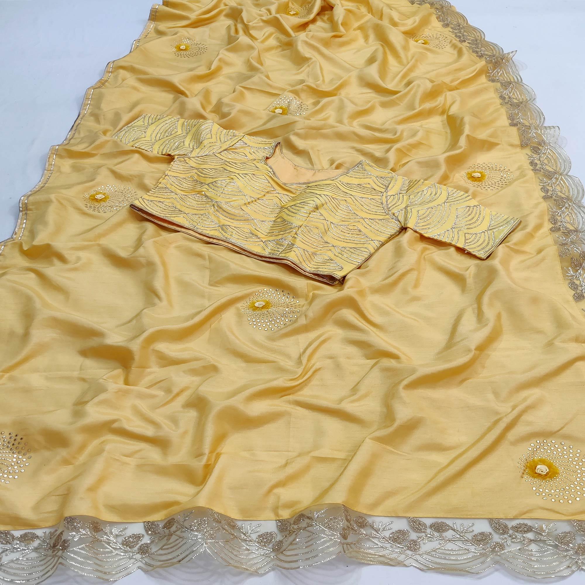 Peachmode Light Yellow Partywear Floral Mukeish Embroidered Dola Silk Saree