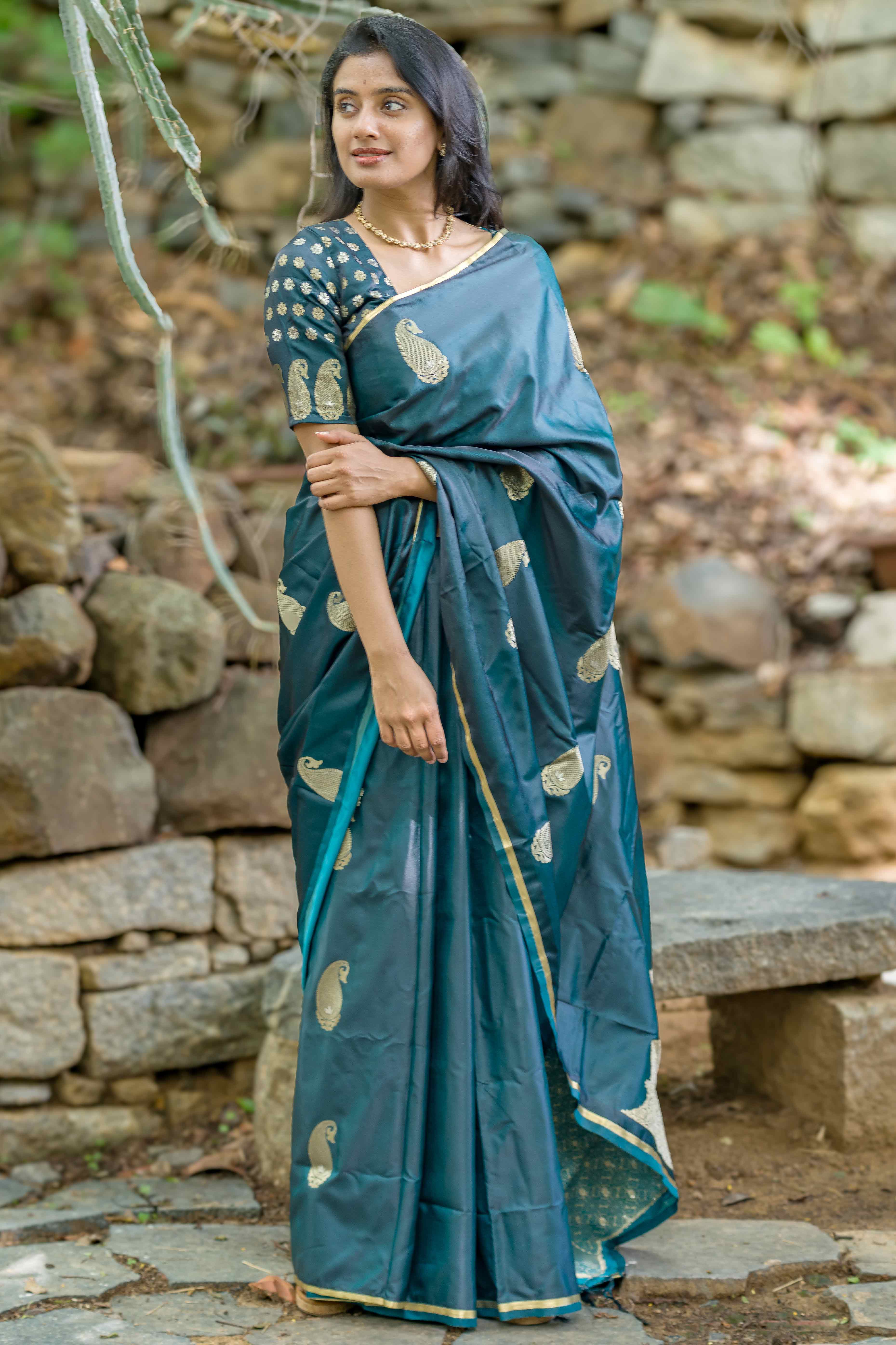Peachmode Casal Green Zari Weaving Satin Saree With Tassels