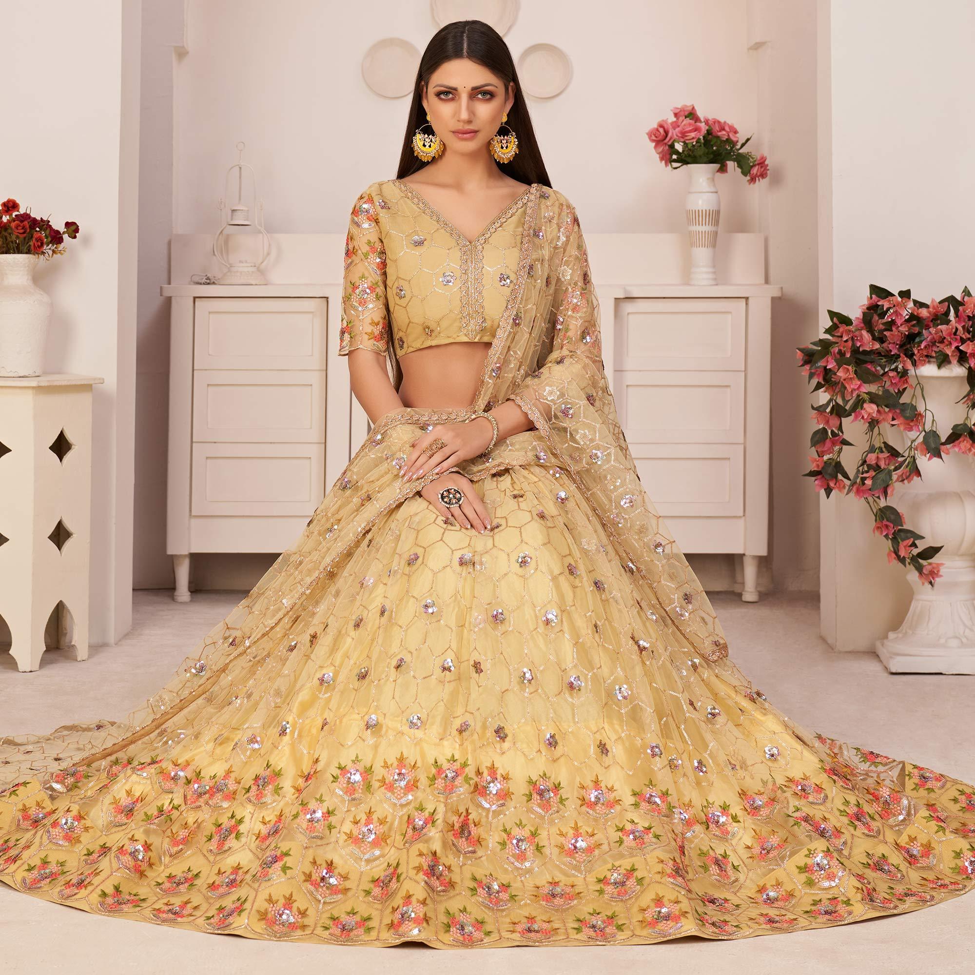 Peachmode Lemon Yellow Party Wear Embroidered Netted Lehenga Choli