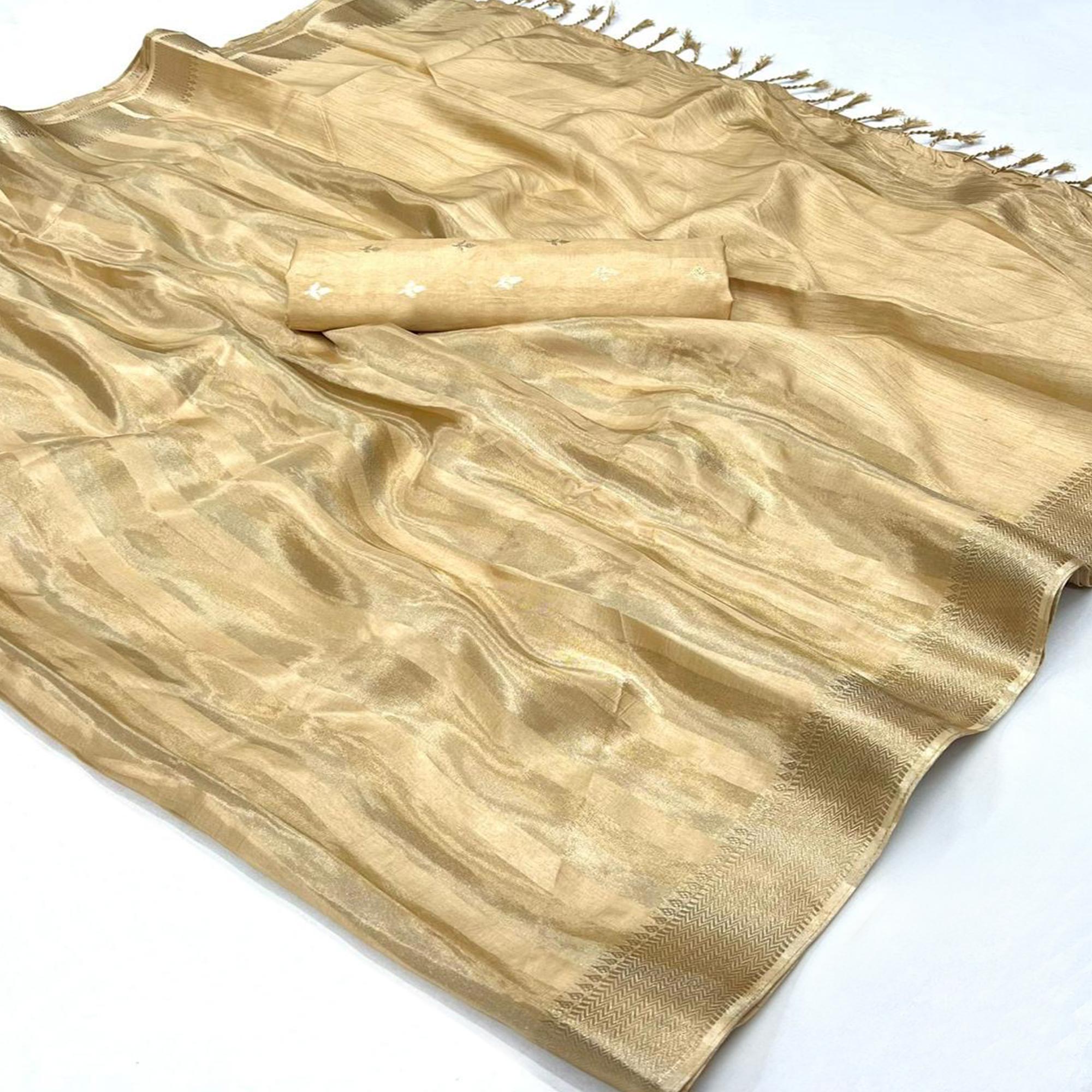Peachmode Cream Woven Viscose Saree With Tassels
