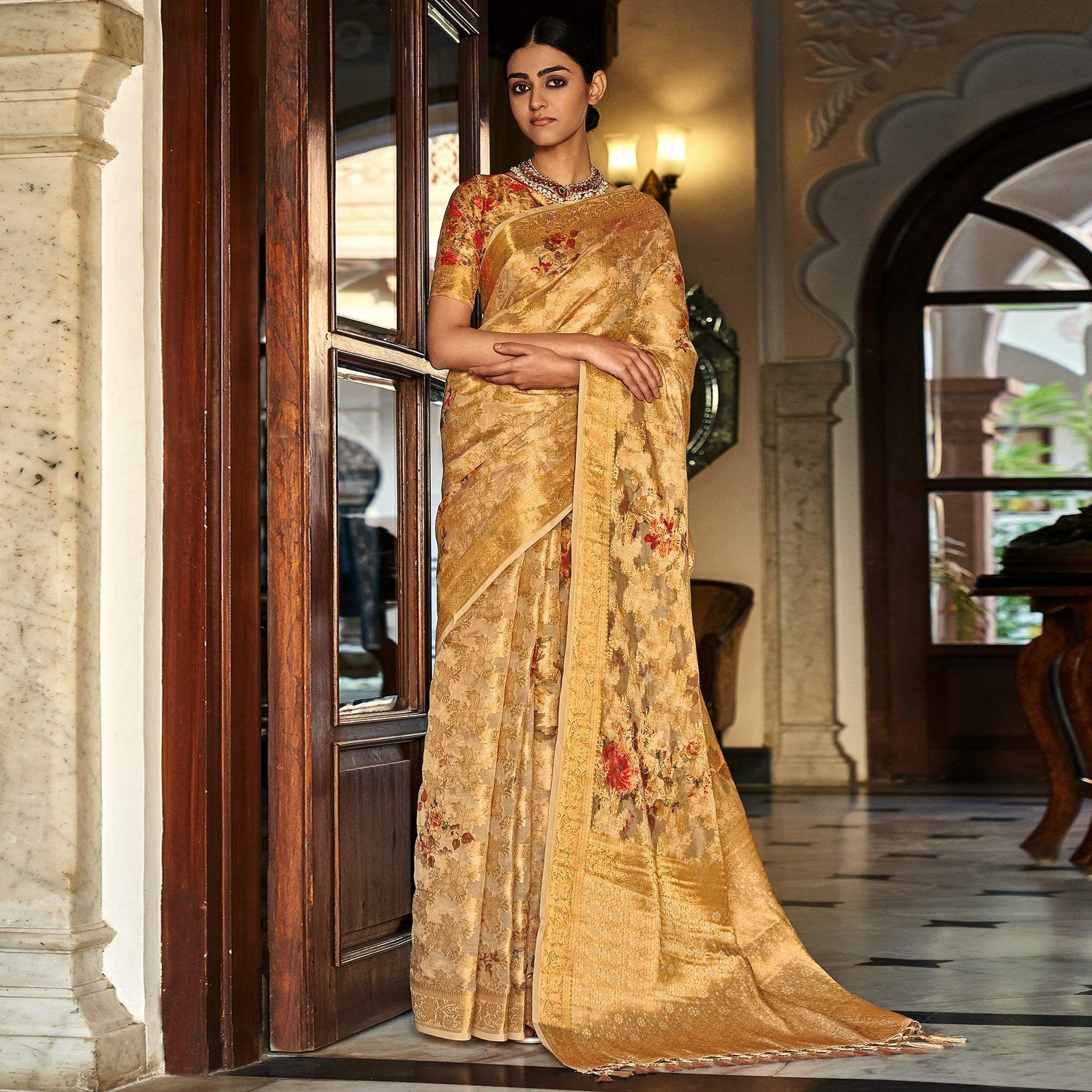 Peachmode Cream Woven With Printed Cotton Silk Saree With Tassels