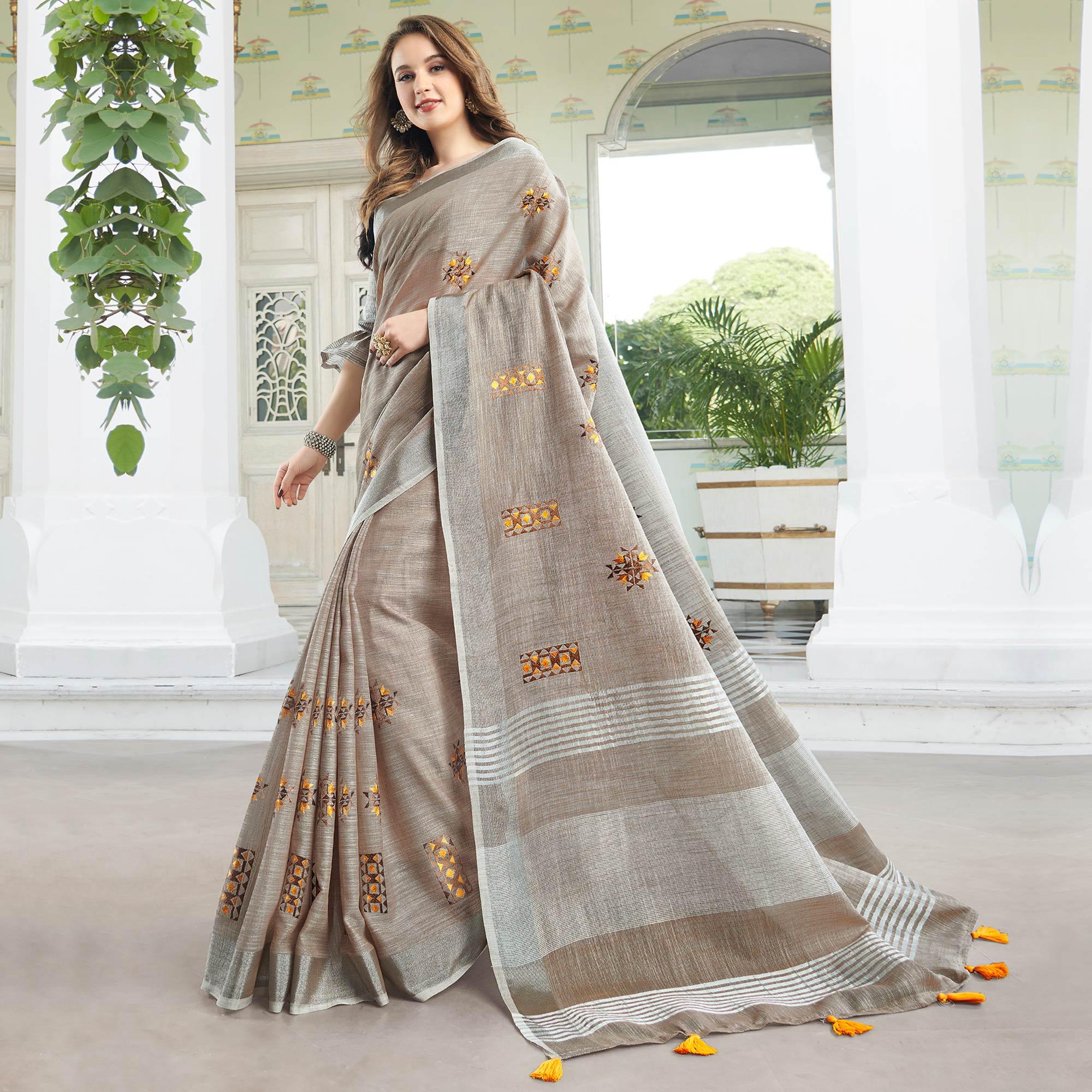 Peachmode Classy Pastel Brown Colored Casual Wear Floral Embroidered Linen-Cotton Saree With Tassels
