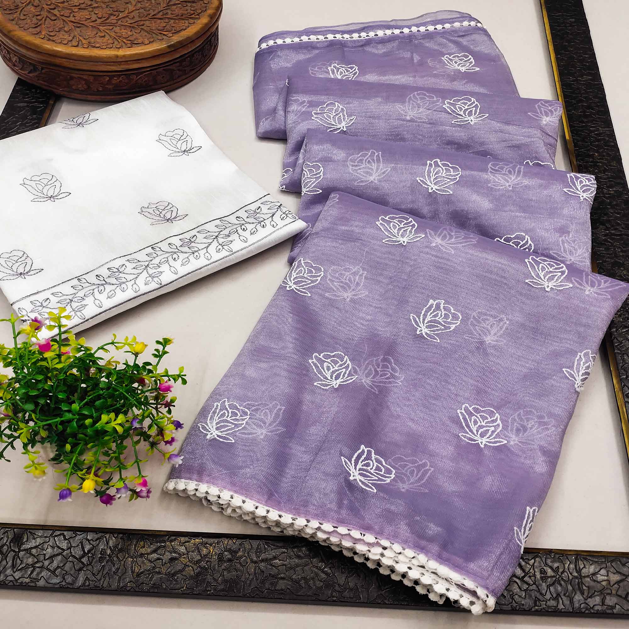Peachmode Lavender Floral Embroidered Net Saree