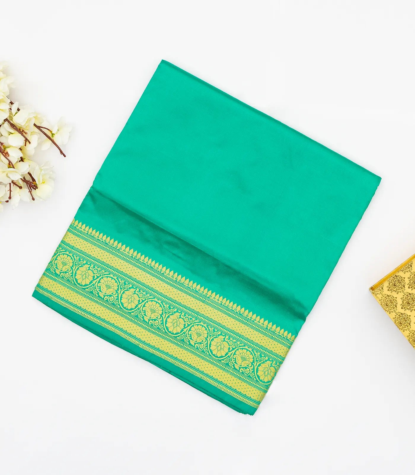 RmKV Aquamarine woven Plain Banarasi Silk Saree With Floral Motifs In Border