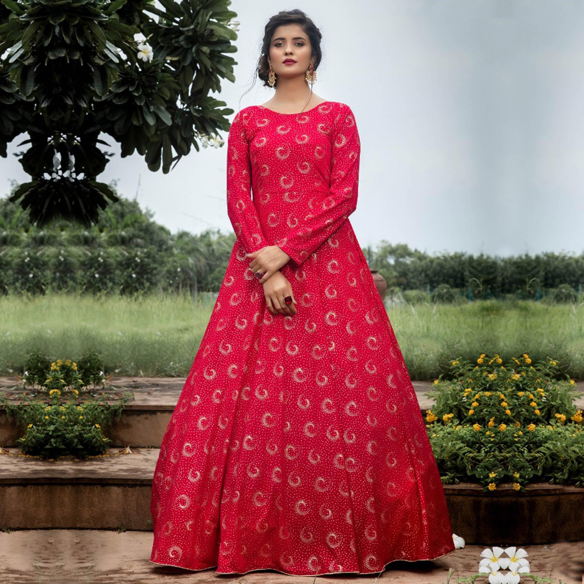 Peachmode Flattering Pink Colored Party Wear Foil Printed Georgette Gown