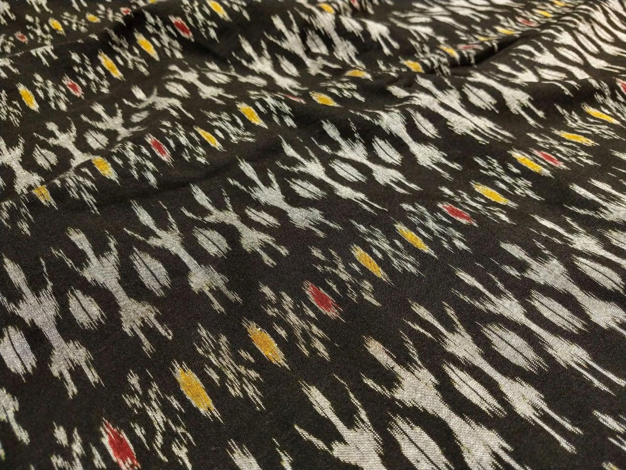 IndianVillèz White Tribal on Black with Red & Yellow Motif Cotton Ikat Fabric - view 2