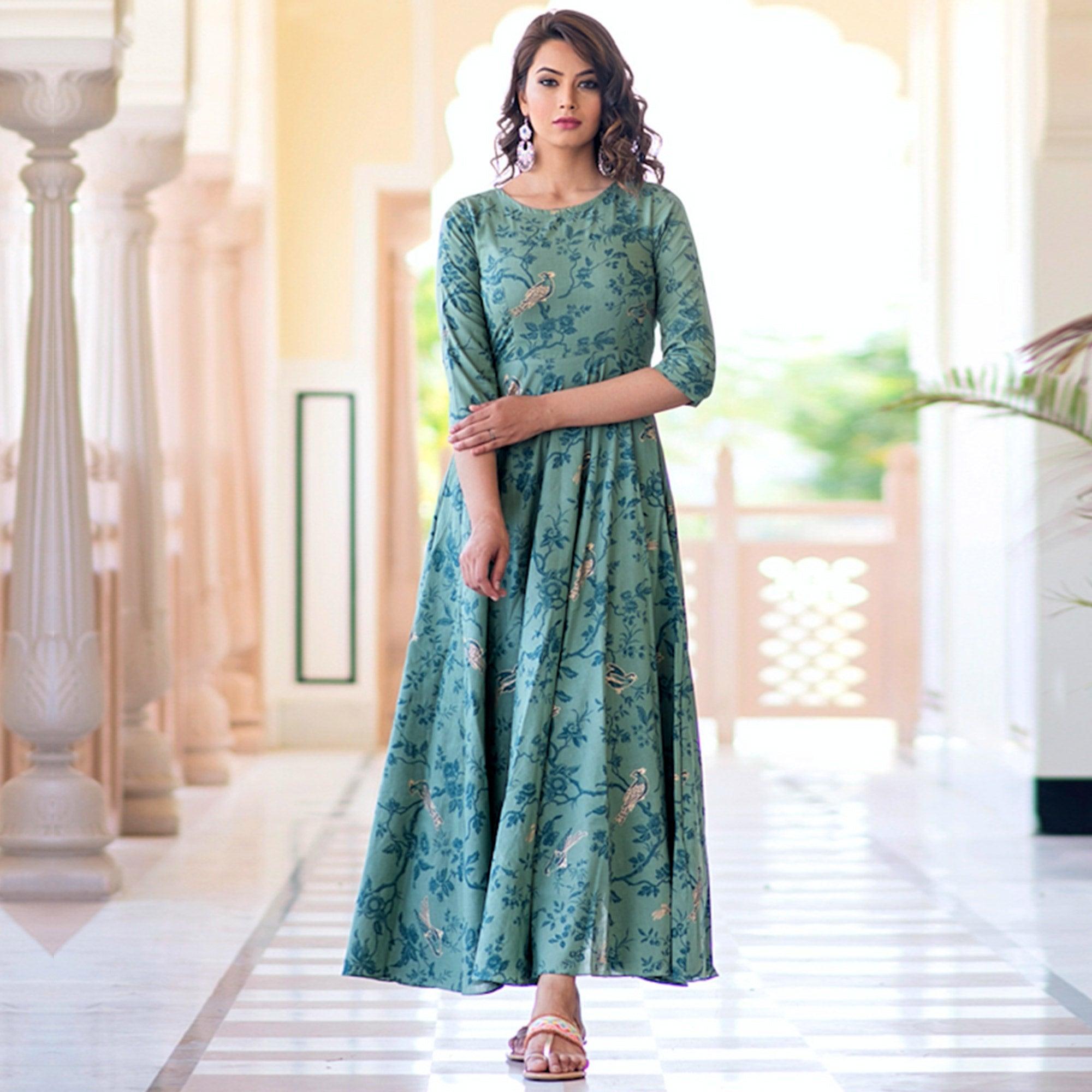 Peachmode Seller Magnetic Light Aqua Colored Partywear Printed Muslin Blend Long Kurti