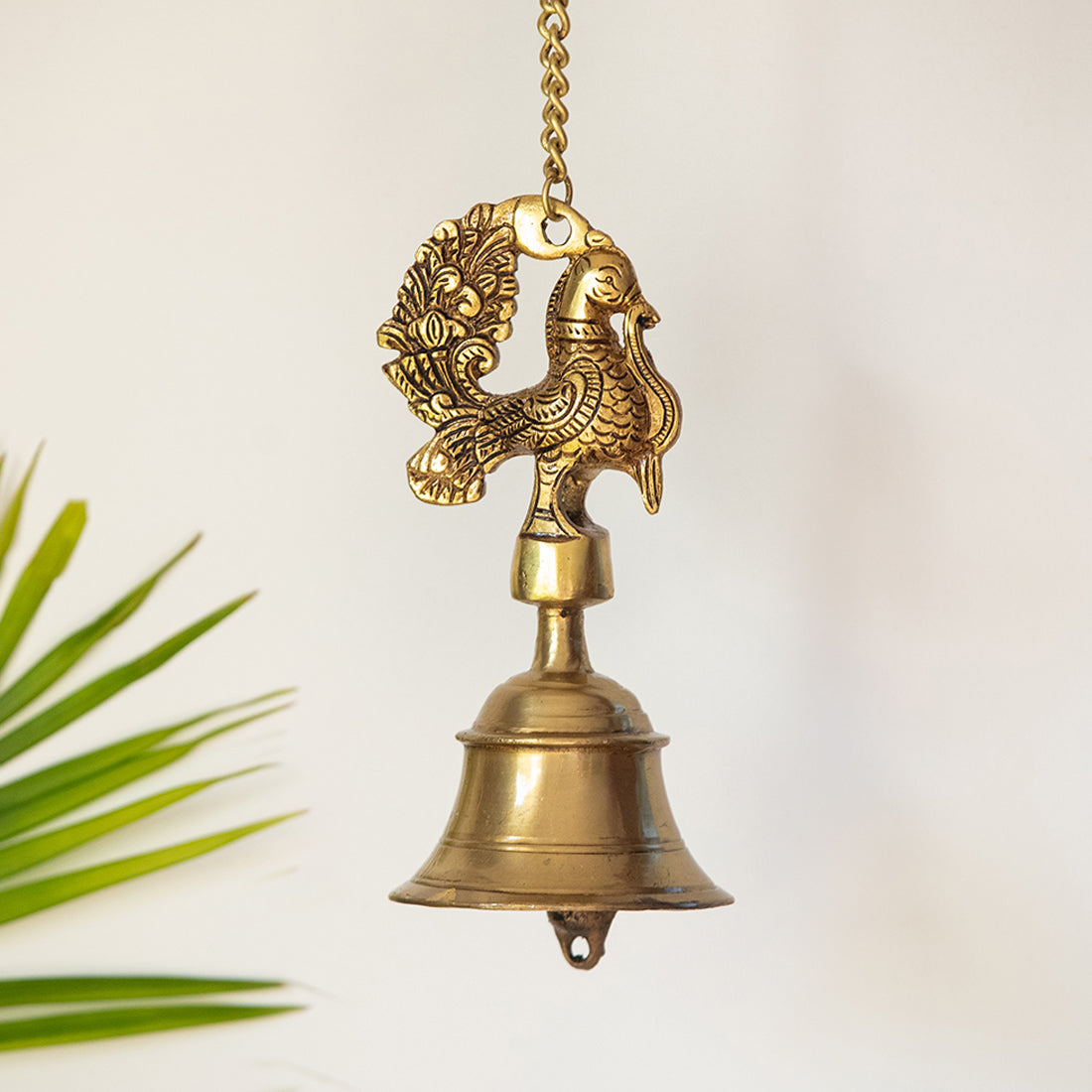 EXCLUSIVELANE 'Elegant Peacock' Hand-Etched Decorative Hanging Bell In Brass