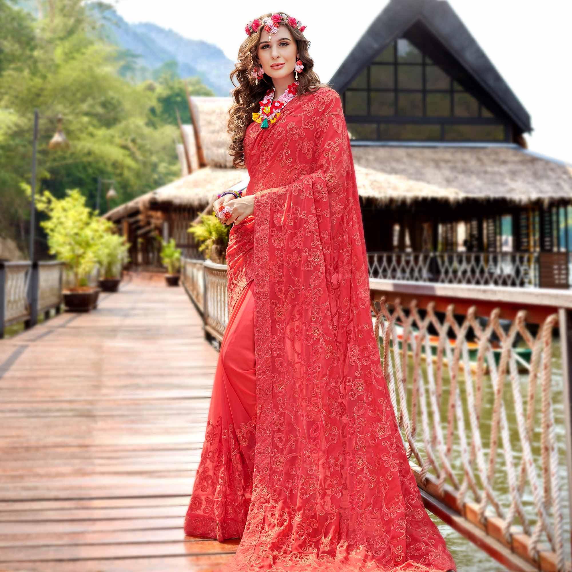 Peachmode Imposing Coral Red Colored Partywear Embroidered Georgette Saree