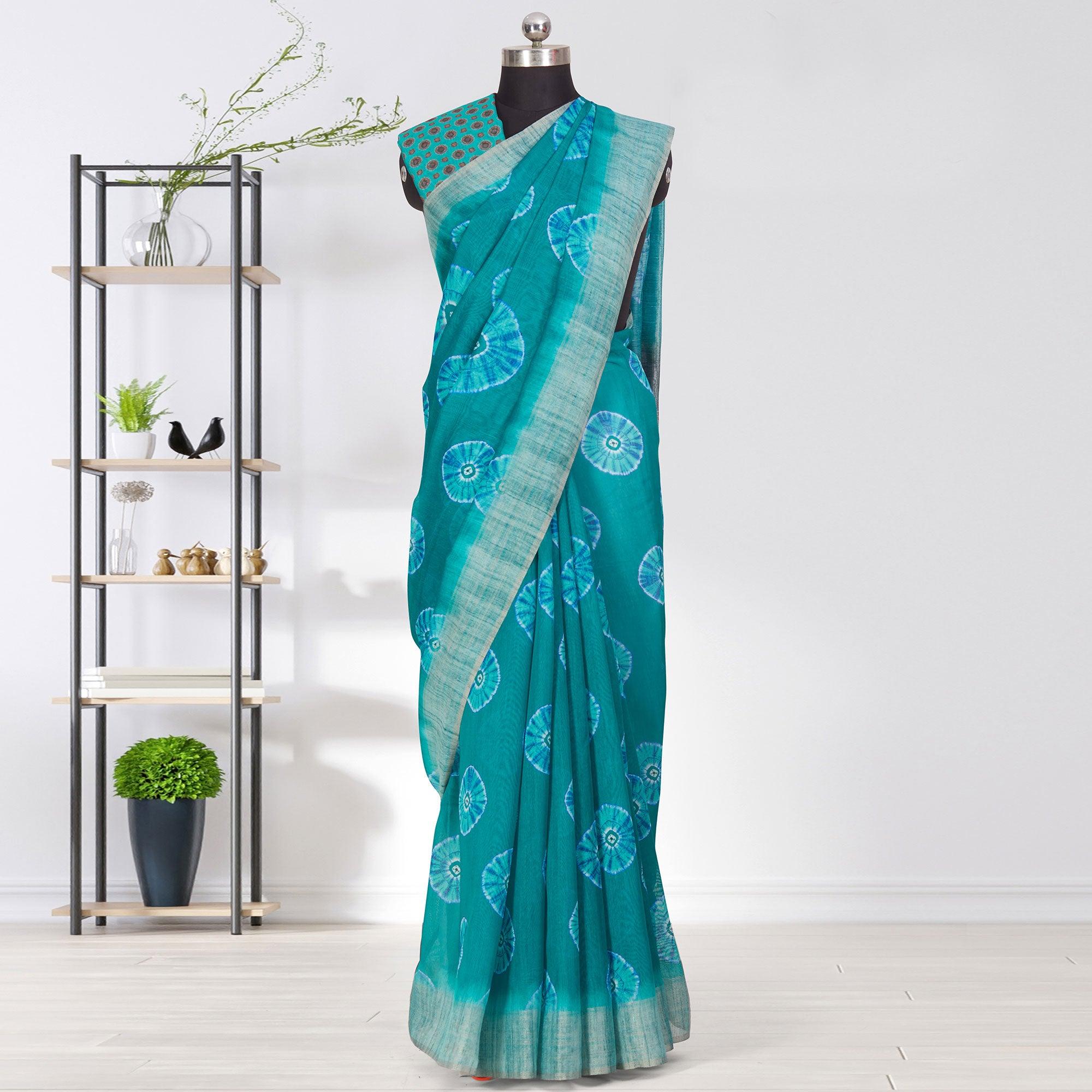 Peachmode Engrossing Turquoise Coloured Casual Wear Printed Linen Saree
