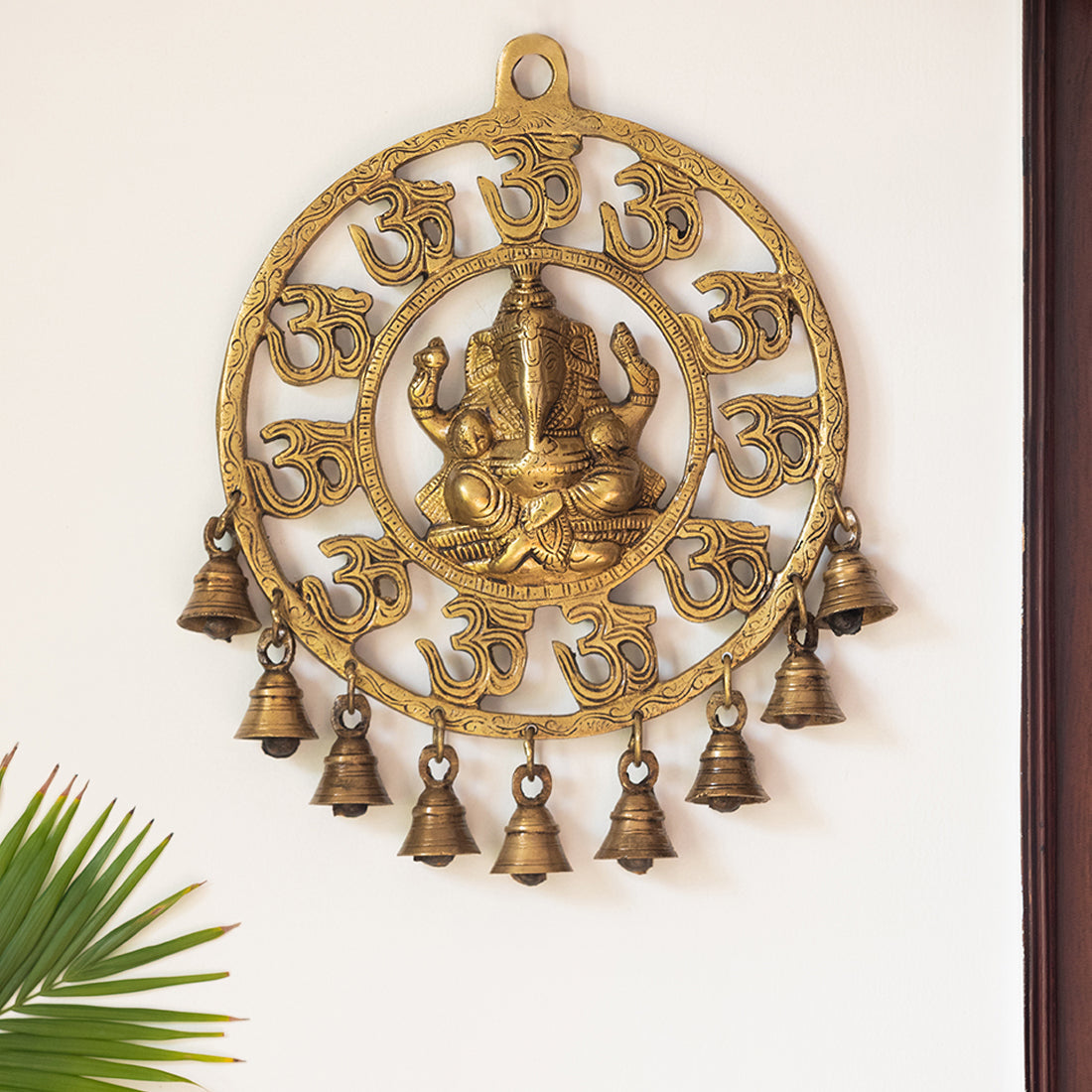 EXCLUSIVELANE 'Mahaganpati' Hand-Etched Wall Décor Hanging with Bells In Brass (9 Bells)