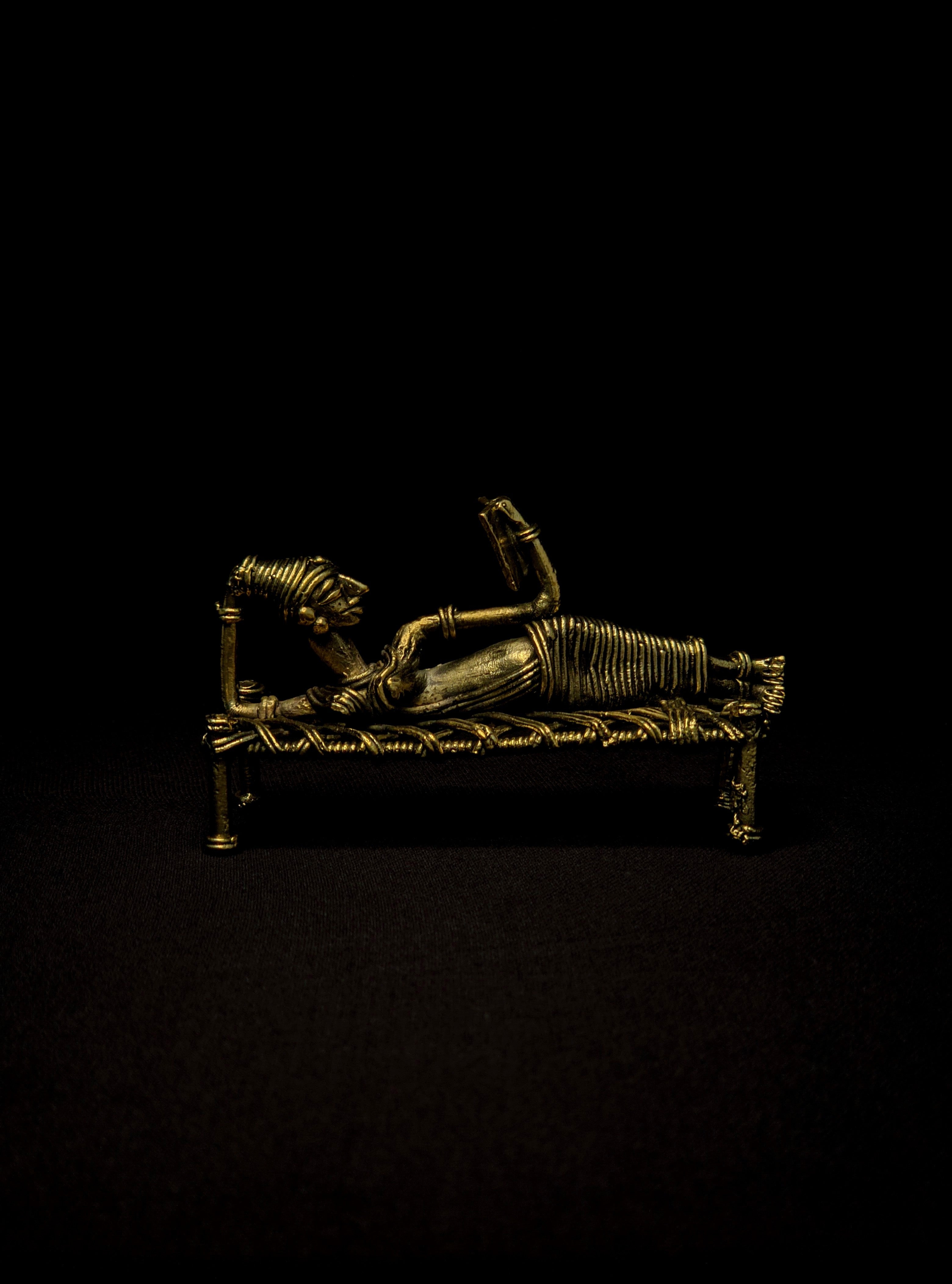 IndianVillèz Dhokra - Tribal Lady Sleeping on Bed and Reading