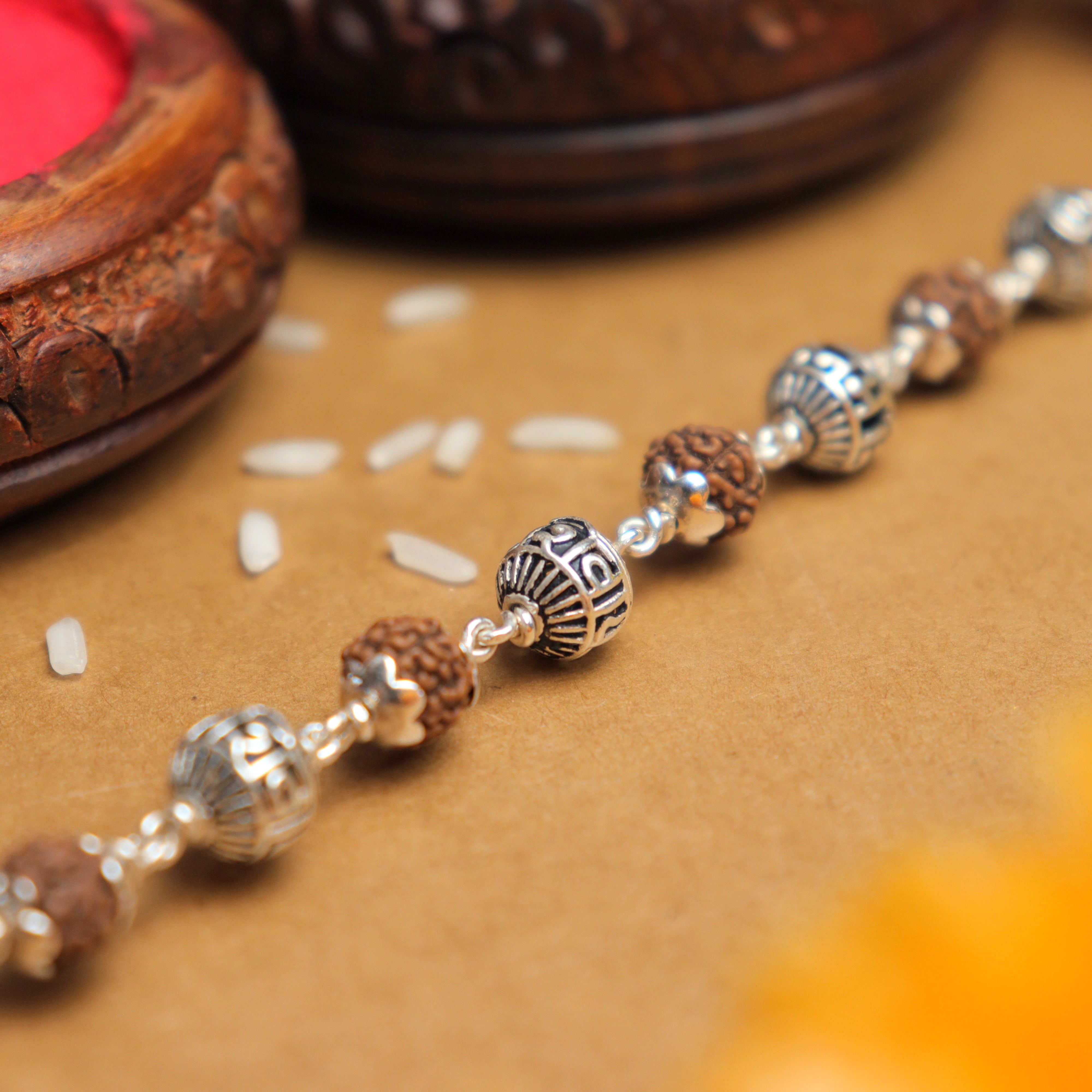 Prinjal Jewellers Silver Rakhi with Rudraksha and Om Namah Shivay Beads
